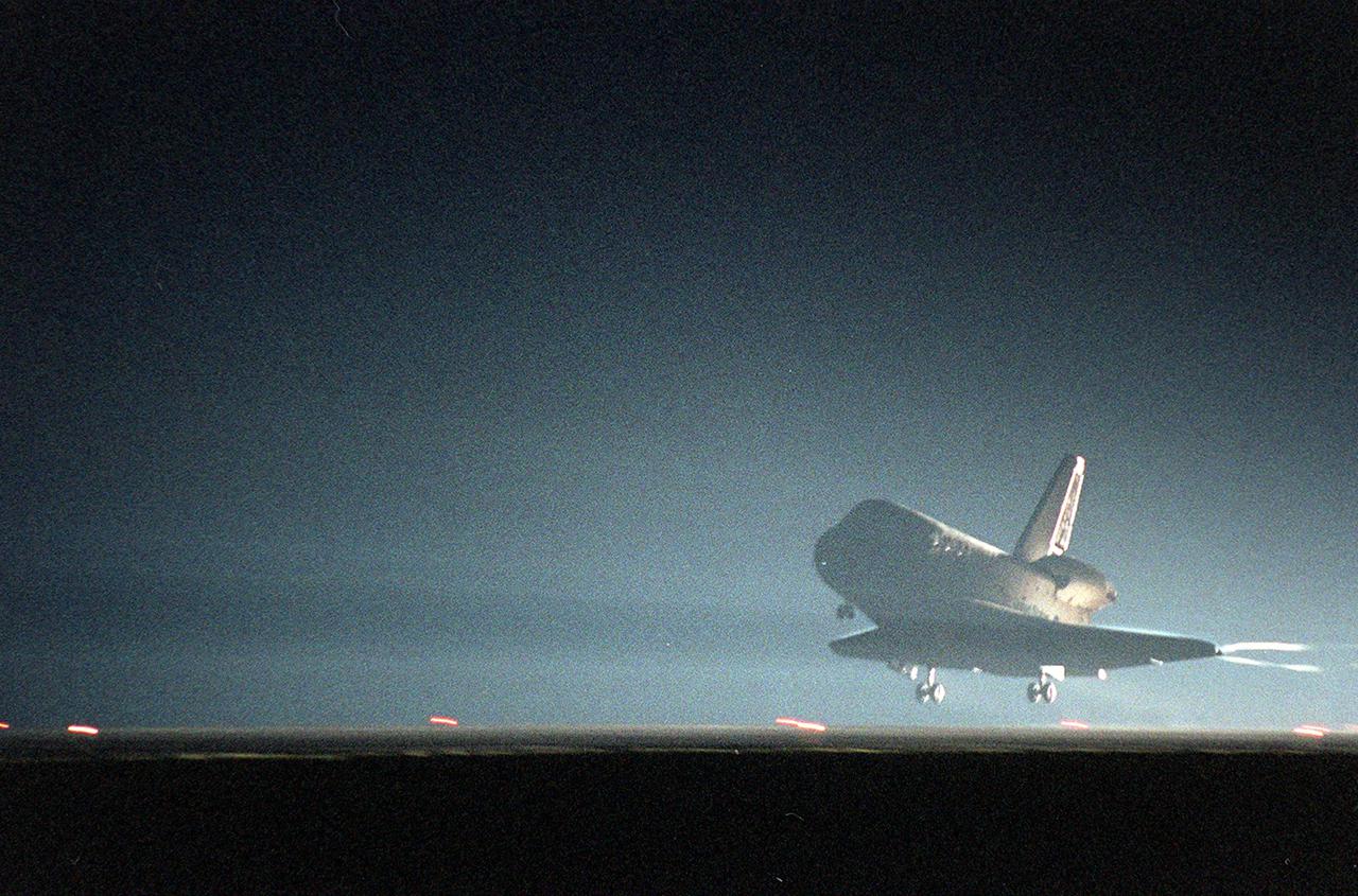 KENNEDY SPACE CENTER, Fla. -- Space Shuttle Discovery prepares to land at the KSC Shuttle Landing Facility on runway 15. Main gear touchdown occurred about 2:31:42 a.m. EST, nose wheel touchdown at 2:31:54 a.m., and wheel stop at 2:33:06 a.m. The landing, on orbit 201, concluded mission STS-102, the eighth flight to the International Space Station, carrying the first Multi-Purpose Logistics Module Leonardo, to the ISS and Expedition Two, a replacement crew for the Station. The 12-day, 19-hour, 51-minute mission returned both the Leonardo and the first resident crew of the ISS, Expedition One, to KSC. Discovery logged 5.3 million miles on this mission. The landing marked the 54th at KSC in the history of the program, and the 12th night landing at KSC