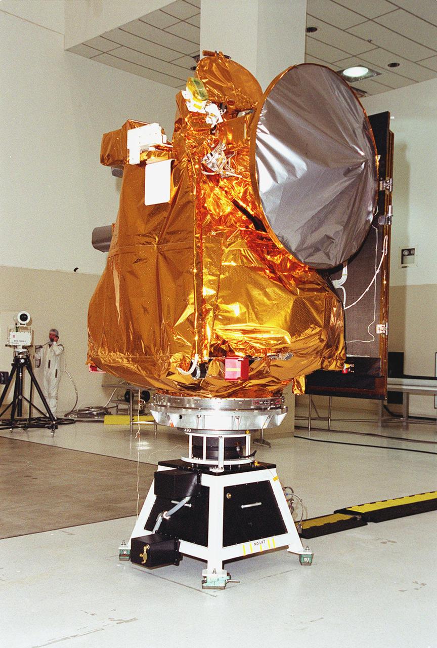 The 2001 Mars Odyssey Orbiter rests on the spin table in the Space Assembly and Encapsulation Building 2. There it will undergo testing. The orbiter carries three science instruments THEMIS, the Gamma Ray Spectrometer (GRS), and the Mars Radiation Environment Experiment (MARIE) that will map the mineralogy and morphology of the Martian surface, the elemental composition of the surface and determine the abundance of hydrogen in the shallow subsurface, and characterize aspects of the near-space radiation environment with regards to the radiation-related risk to human explorers. The Mars Odyssey Orbiter is scheduled for launch on April 7, 2001, aboard a Delta II rocket from Launch Pad 17-A, Cape Canaveral Air Force Station