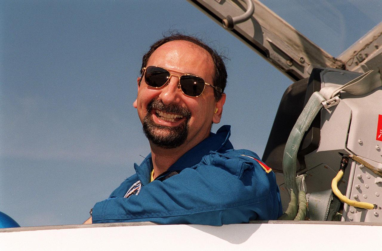 STS-100 Mission Specialist Umberto Guidoni arrives at the KSC Shuttle Landing Facility aboard a T-38 jet aircraft to get ready for launch. Guidoni is with the European Space Agency. The 11-day mission to the International Space Station will deliver and integrate the Spacelab Logistics Pallet_Launch Deployment Assembly, which includes the Space Station Remote Manipulator system and the UHF Antenna, and the Multi-Purpose Logistics Module Raffaello. Liftoff on mission STS-100 is scheduled at 2:41 p.m. EDT April 19