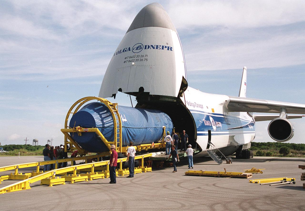 Workers supervise the off-loading of segments of a Lockheed Martin Atlas II rocket from a Russian Antonov AN-124 aircraft at the Skid Strip at Cape Canaveral Air Force Station.; The rocket will be used to launch the Geostationary Operational Environmental Satellite-M (GOES-M), the latest in the current series of advanced geostationary weather satellites in service.; GOES-M is being prepared for launch at the Astrotech Space Operations facility located in the Spaceport Florida Industrial Park in Titusville, Fla. The launch is scheduled for July 15 from Pad 36-A, Cape Canaveral Air Force Station
