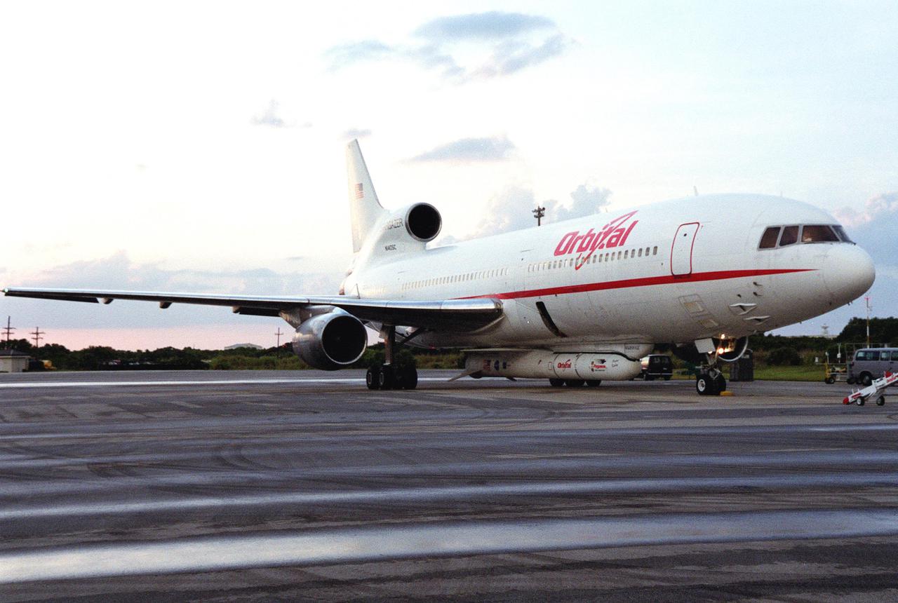 KENNEDY SPACE CENTER, Fla. -- An L-1011 aircraft called the Stargazer is parked after landing at the Skid Strip, Cape Canaveral Air Force Station. Underneath its belly it carries the Orbital Sciences Corp. Pegasus XL launch vehicle with the High Energy Solar Spectroscopic Imager (HESSI) attached. The Pegasus XL will launch the HESSI no earlier than June 12 from CCAFS. The primary mission of HESSI is to explore the basic physics of particle acceleration and energy release in solar flares