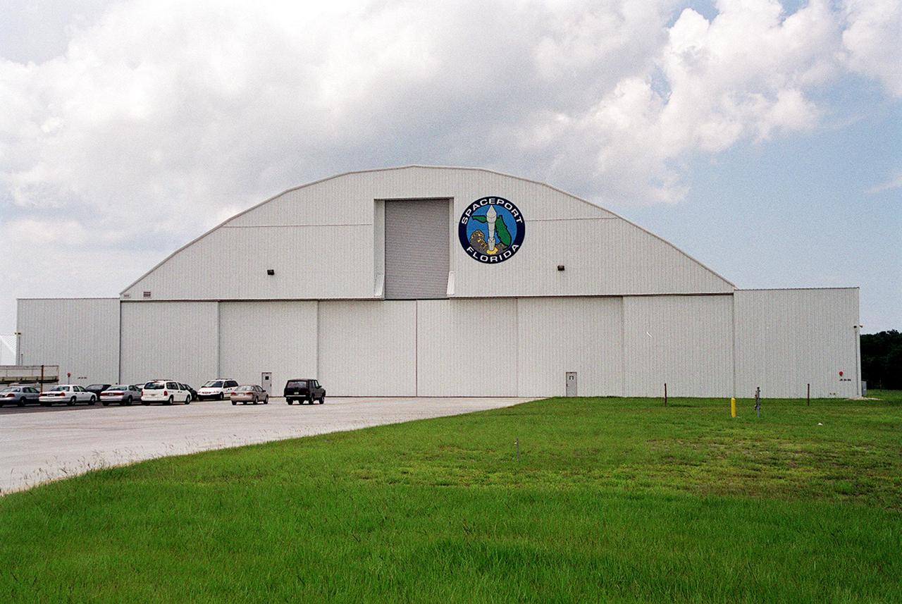KENNEDY SPACE CENTER, Fla. -- This state-developed 50,000-square-foot hangar at Kennedy Space Center is being leased by United Space Alliance (USA) to store and maintain Space Shuttle ground equipment. The hangar was originally developed by the state as part of a joint NASA_ Spaceport Florida Authority (SFA) Reusable Launch Vehicle Support Complex at Kennedy Space Center. A ceremony at the site included the signing of a lease agreement between SFA and USA