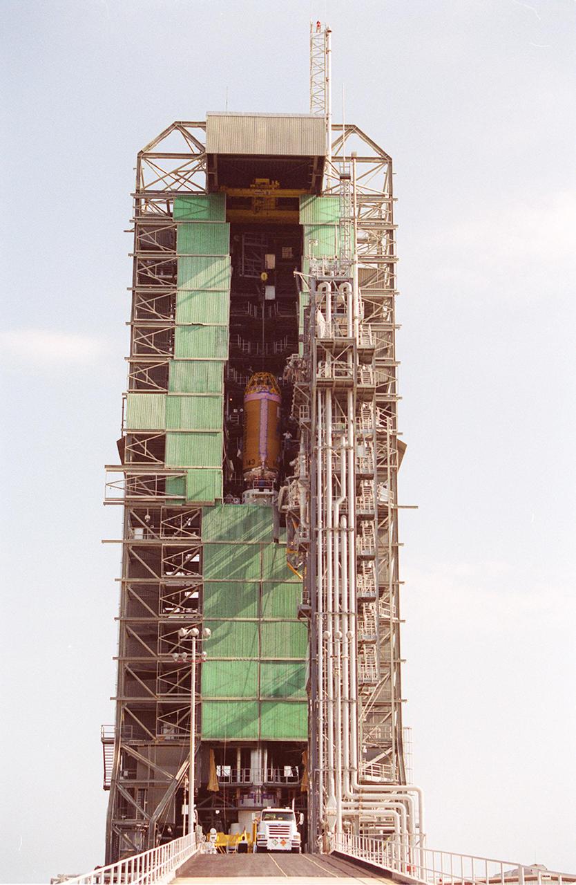 KENNEDY SPACE CENTER, Fla. -- The Lockheed Martin Atlas_Centaur segment of the Atlas II rocket is lowered onto the first (booster) stage of the Atlas II rocket at Launch Pad 36-A, Cape Canaveral Air Force Station. . The rocket is scheduled to launch the Tracking and Data Relay Satellite, known as TDRS-I, in January 2002. The TDRS System (TDRSS) is a communication signal relay system that provides tracking and data acquisition services between low-Earth orbiting spacecraft and NASA_customer control and_or data processing facilities. The system is capable of transmitting to and receiving data from customer spacecrafts over 100 percent of their orbit (some limitations may apply depending on actual orbit). The TDRS-I provides a Ka-band service that will allow customers with extremely high data rates to be supported by the Tracking and Data Relay Satellite System (TDRSS) if they desire.