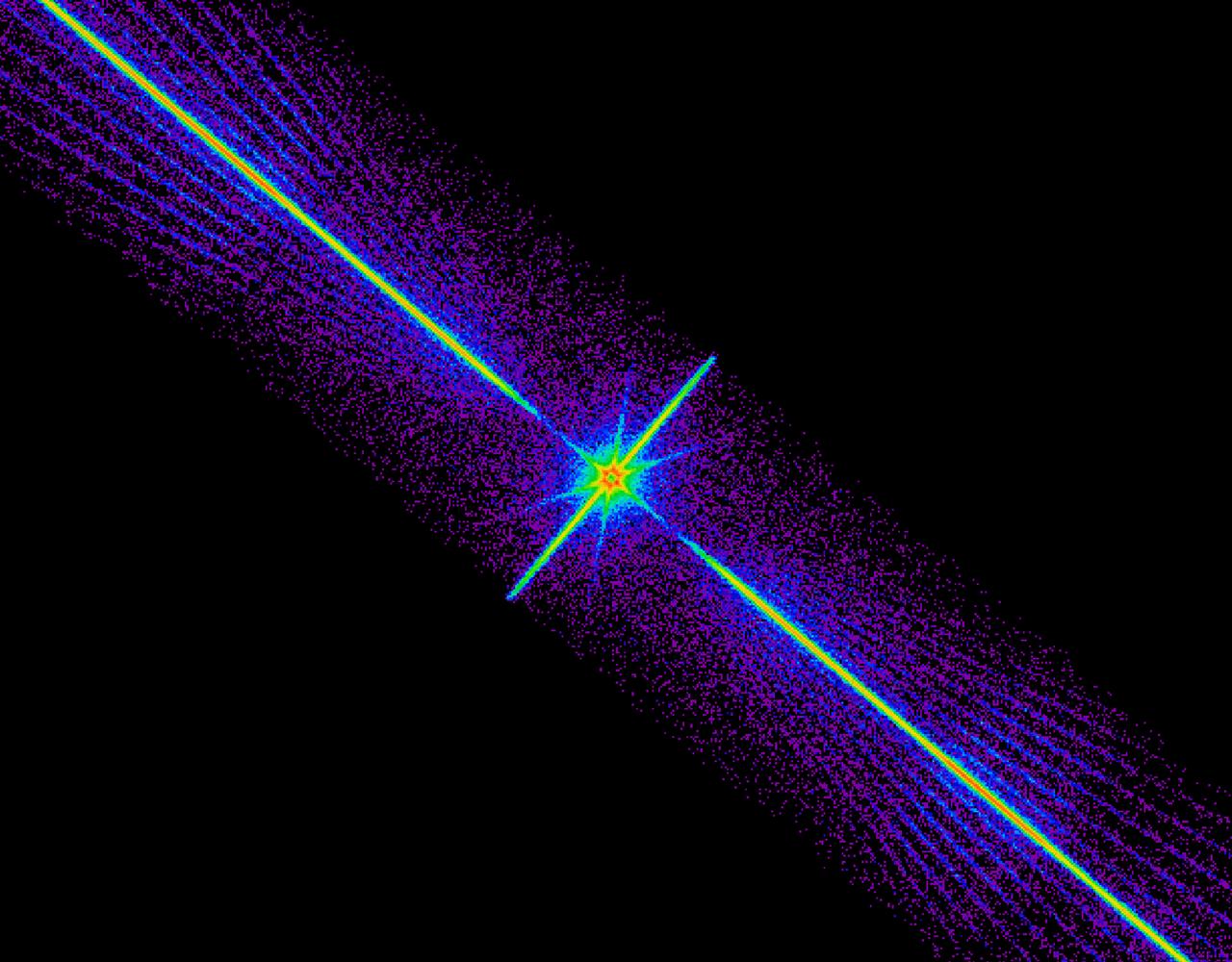 This Chandra X-Ray Observatory (CXO) image is a spectrum of a black hole, which is similar to the colorful spectrum of sunlight produced by a prism. The x-rays of interest are shown here recorded in bright stripes that run rightward and leftward from the center of the image. These x-rays are sorted precisely according to their energy with the highest-energy x-rays near the center of the image and the lower-energy x-rays farther out. The spectrum was obtained by using the Low Energy Transmission Grating (LETG), which intercepts x-rays and changes their direction by the amounts that depend sensitively on the x-ray energy. The assembly holds 540 gold transmission gratings. When in place behind the mirrors, the gratings intercept the x-rays reflected from the telescope. The bright spot at the center is due to a fraction of the x-ray radiation that is not deflected by the LETG. The spokes that intersect the central spot and the faint diagonal rays that flank the spectrum itself are artifacts due to the structure that supports the LETG grating elements. (Photo credit: NASA Cfa/J. McClintock et al)