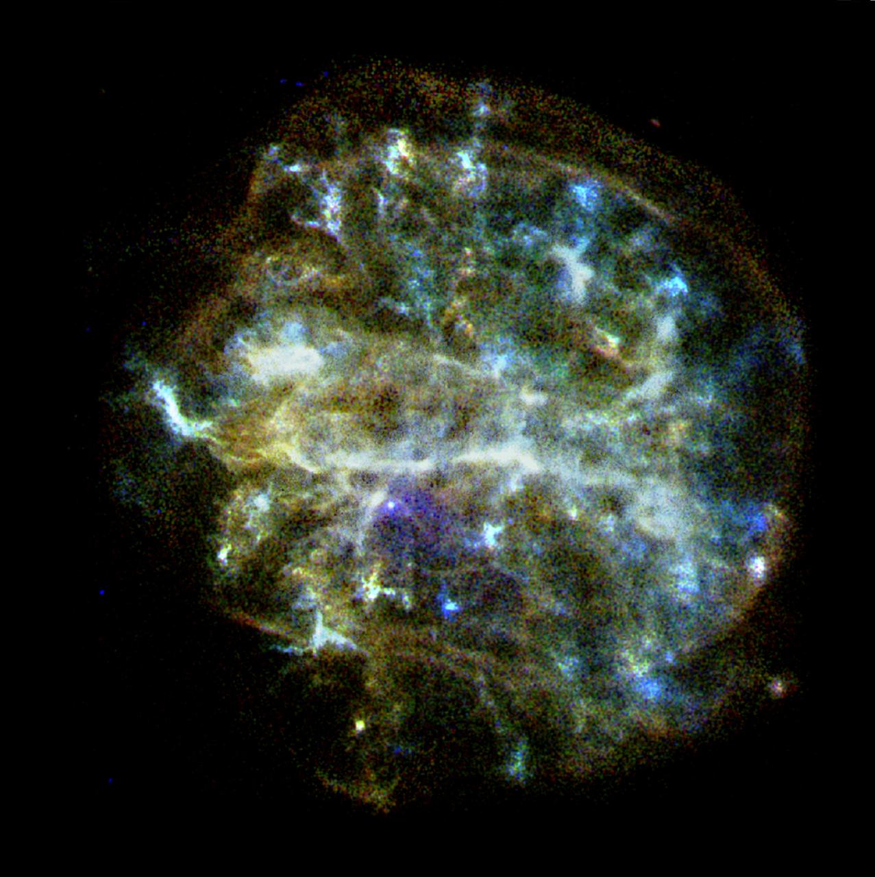 The Chandra X-Ray Observatory has captured this spectacular image of G292.0+1.8, a young, oxygen-rich supernova remnant with a pulsar at its center surrounded by outflowing material. This image shows a rapidly expanding shell of gas that is 36 light-years across and contains large amounts of elements such as oxygen, neon, magnesium, silicon and sulfur. Embedded in this cloud of multimillion-degree gas is a key piece of evidence linking neutron stars and supernovae produced by the collapse of massive stars. With an age estimated at 1,600 years, G292.0+1.8 is one of three known oxygen-rich supernovae in our galaxy. These supernovae are of great interest to astronomers because they are one of the primary sources of the heavy elements necessary to form planets and people. Scattered through the image are bluish knots of emissions containing material that is highly enriched in newly created oxygen, neon, and magnesium produced deep within the original star and ejected by the supernova explosion.