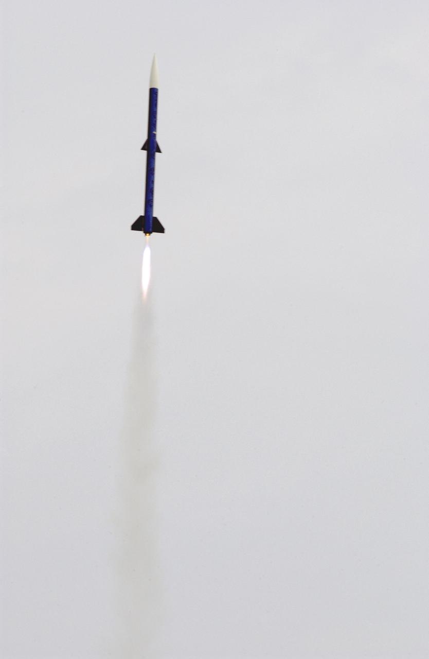 Filled with anticipation, students from three Huntsville area high schools: Randolph, Sparkman, and Johnson High Schools, counted down to launch the rockets they designed and built at the Army test site on Redstone Arsenal in Huntsville, Alabama. The projected two-mile high launch culminated more than a year's work and demonstrated the student team's ability to meet the challenge set by the Marshall Space Flight Center's (MSFC) Student Launch Initiative program to apply science and math to experience, judgment, and common sense, and proved to NASA officials that they have successfully built reusable launch vehicles (RLVs), another challenge set by NASA's SLI program. MSFC's SLI program is an educational effort that aims to motivate students to pursue careers in science, math, and engineering. It provides hands-on, practical aerospace experience. In this picture, a rocket built by Johnson High School students soars to it projected designation.