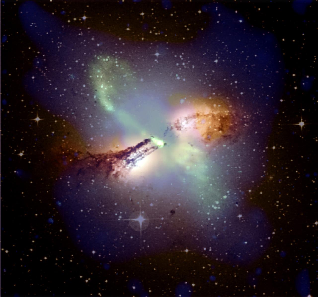 This is a photo taken by NASA's Chandra X-ray Observatory that reveals the remains of an explosion in the form of two enormous arcs of multimillion-degree gas in the galaxy Centaurus A that appear to be part of a ring 25,000 light years in diameter. The size and location of the ring suggest that it could have been an explosion that occurred about 10 million years ago. A composite image made with radio (red and green), optical (yellow-orange), and X-ray data (blue) presents a sturning tableau of a turbulent galaxy. A broad band of dust and cold gas is bisected at an angle by opposing jets of high-energy particles blasting away from the supermassive black hole in the nucleus. Lying in a plane perpendicular to the jets are the two large arcs of x-ray emitting multi-million degree gas. This discovery can help astronomers better understand the cause and effect of violent outbursts from the vicinity of supermassive black holes of active galaxies. The Chandra program is managed by the Marshall Space Flight Center in Huntsville, Alabama.