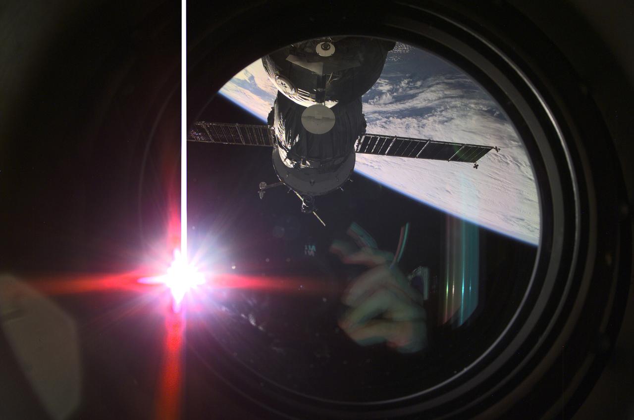 Carrying out a flight program for the French Space Agency (CNES) under a commercial contract with the Russian Aviation and Space Agency, a Russian Soyuz spacecraft approaches the International Space Station (ISS), delivering a crew of three for an eight-day stay. Aboard the craft are Commander Victor Afanasyev, Flight Engineer Konstantin Kozeev, both representing Rosaviakosmos, and French Flight Engineer Claudie Haignere.