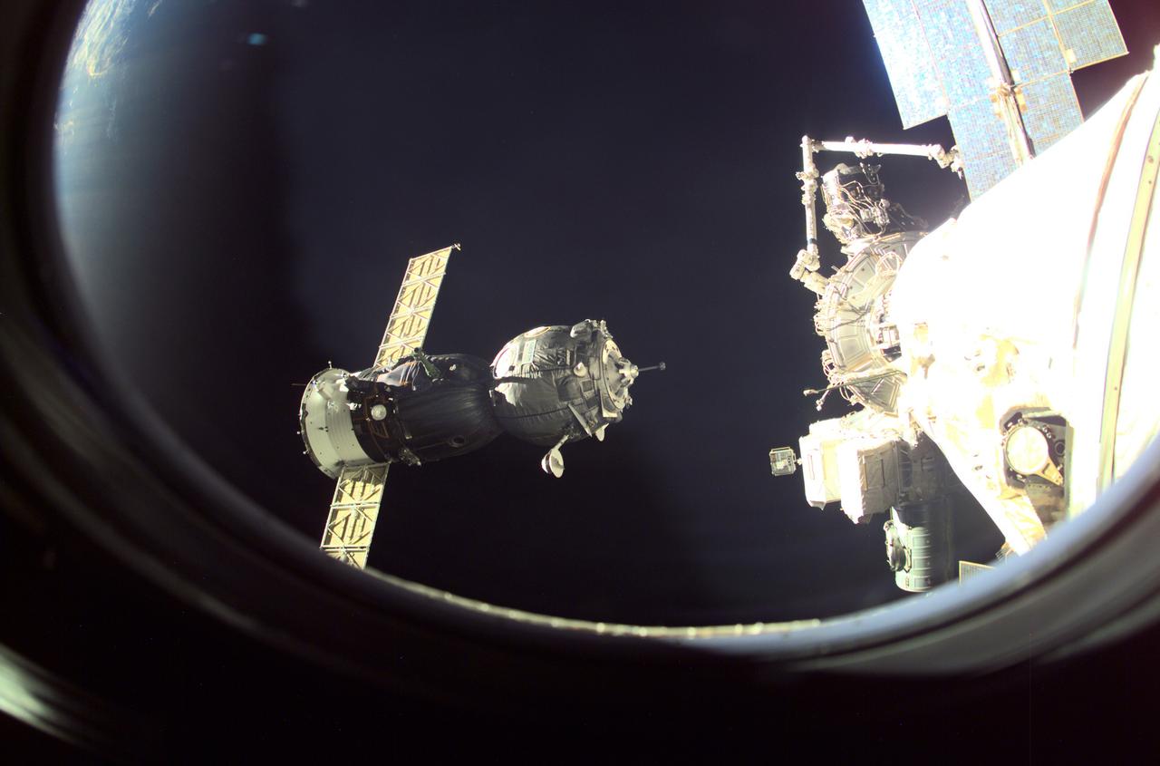 Carrying out a flight program for the French Space Agency (CNES) under a commerial contract with the Russian Aviation and Space Agency, a Russian Soyuz spacecraft approaches the International Space Station (ISS) delivering a crew of three for an eight-day stay. Aboard the craft are Commander Victor Afanasyev, Flight Engineer Konstantin Kozeev, both representing Rosaviakosmos, and French Flight Engineer Claudie Haignere.