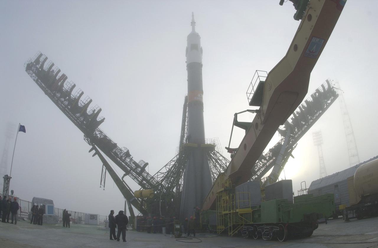 The Soyuz TM-31 launch vehicle is shown in the vertical position for its launch from Baikonur, carrying the first resident crew to the International Space Station. The Russian Soyuz launch vehicle is an expendable spacecraft that evolved out of the original Class A (Sputnik). From the early 1960s until today, the Soyuz launch vehicle has been the backbone of Russia's marned and unmanned space launch fleet. Today, the Soyuz launch vehicle is marketed internationally by a joint Russian/French consortium called STARSEM. As of August 2001, there have been ten Soyuz missions under the STARSEM banner.