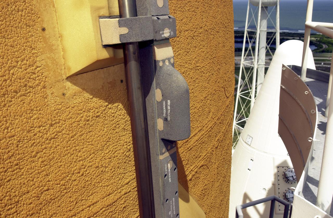 This is a view of the video camera mounted on the External Tank (ET) of the Space Shuttle Orbiter Atlantis (STS-112). The camera provided a view of the front and belly of the orbiter, a portion of the Solid Rocket Boosters (SRBs), and ET during the launch. Located high on the ET liquid oxygen tank cable tray, the camera, 6 inches long and resembling a short thin flashlight, is inside an aluminum fairing covered in protective insulating foam. The battery pack and transmitter are contained in an electronics box and mounted in the intertank crossbeam inside the ET. The camera turned on 15 minutes prior to launch and operated for about 15 minutes following liftoff. At liftoff, viewers saw the Shuttle clearing the launch tower and, at 2 minutes after liftoff, saw the right SRB separate from the ET, and ET separation about 8 minutes into the flight. The video was downlinked from the ET during flight to several NASA data-receiving sites and then relayed to the live television broadcast. It provided the STS-112 team an opportunity to monitor the Shuttle's performance from a new angle. Launched on October 7, 2002, Atlantis carried its primary payload, the S1 Truss for the International Space Station.