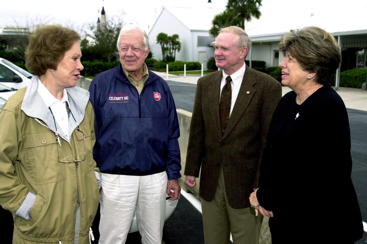 KENNEDY SPACE CENTER, FLA. - Rosalyn and Jimmy Carter, former first lady and U.S. President , talk with Center Director Roy D. Bridges Jr. and Director of External Affairs and Business Development JoAnn H. Morgan.  The Carters are touring Kennedy Space Center