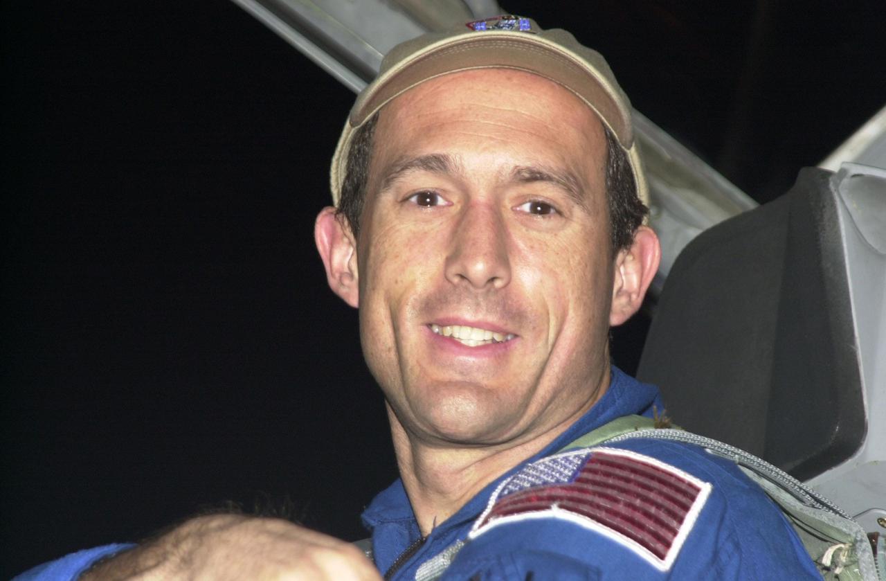 KENNEDY SPACE CENTER, Fla. - STS-109 Mission Specialist James Newman arrives at KSC aboard a T-38 jet aircraft to begin launch preparations. This is Newman's fourth Shuttle flight. The goal of the 11-day mission is repair and maintenance on the Hubble Space Telescope. Five spacewalks are planned to replace Solar Array 2 with Solar Array 3, replace the Power Control Unit, remove the Faint Object Camera and install the Advanced Camera for Surveys (ACS), install the Near Infrared Camera and Multi-Object Spectrometer (NICMOS) Cooling System, and install New Outer Blanket Layer insulation. Launch is scheduled for Feb. 28 at 6:48 a.m. EST