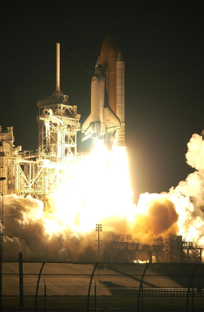 KENNEDY SPACE CENTER, Fla. -  Flames and smoke stream from behind Space Shuttle Columbia as it leaps off the launch pad on its 27th flight into space on mission STS-109.  Liftoff occurred at 6:22:02:08 a.m. EST (11:22:02:08 GMT). The goal of the mission is the maintenance and upgrade of the Hubble Space Telescope, to be carried out in five spacewalks.  The crew of STS-109 comprises Commander Scott D. Altman, Pilot Duane G. Carey, Payload Commander John M. Grunsfeld, and Mission Specialists Nancy Jane Currie, Richard M. Linnehan, James H. Newman and Michael J. Massimino.  After an 11-day mission, Columbia is expected to return to Kennedy March 12 about 4:35 a.m. EST (09:35 GMT).