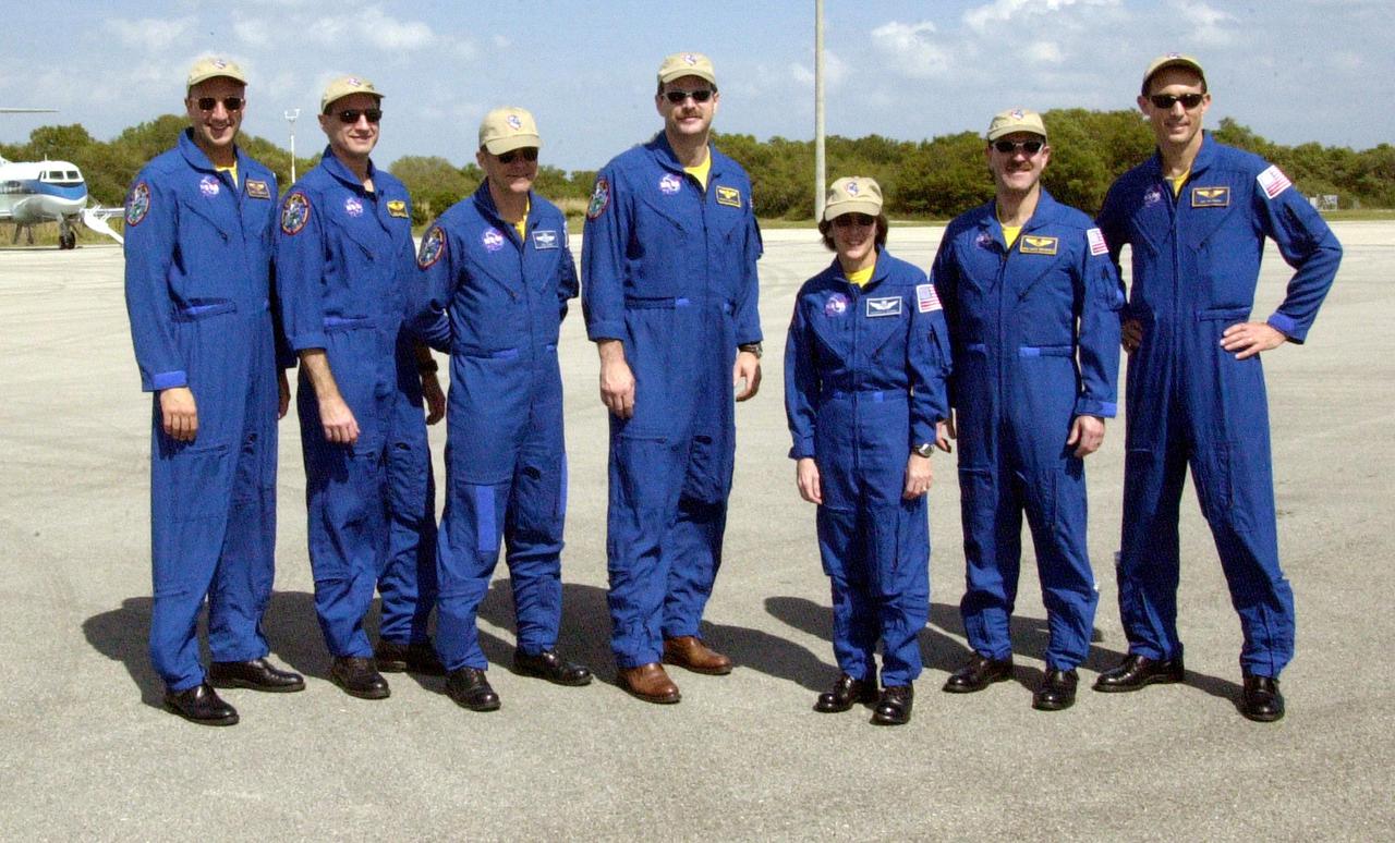 KENNEDY SPACE CENTER, FLA. - The STS-109 crew poses at the Cape Canaveral Air Force Station Skid Strip before departing for Houston.  The crew returned to KSC aboard Columbia March 12 after an 11-day mission servicing the Hubble Space Telescope.  From left to right are Mission Specialists Michael Massimino and Richard Linnehan; Pilot Duane Carey; Commander Scott Altman; and Mission Specialists Nancy Currie, John Grunsfeld and James Newman.  Grunsfeld was Payload Commander on the mission