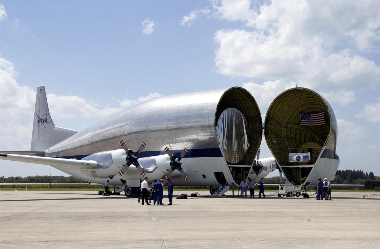 KENNEDY SPACE CENTER, FLA. -- The open nose of the Super Guppy transport aircraft reveals its cargo, the S5 truss segment for the International Space Station, inside. After offloading, the S5 truss will be transferred to the Space Station Processing Facility where it will be fit chedked for a Photo-Voltaic Radiator Grapple Fixture.  It will also undergo a fit check to a truss simulator to make sure S5 will fit together with the S4 and S6 truss segments.  S5 is scheduled for launch in October 2003 on mission STS-118.  It will be the 10th truss assembled as part of a total 11 trusses.