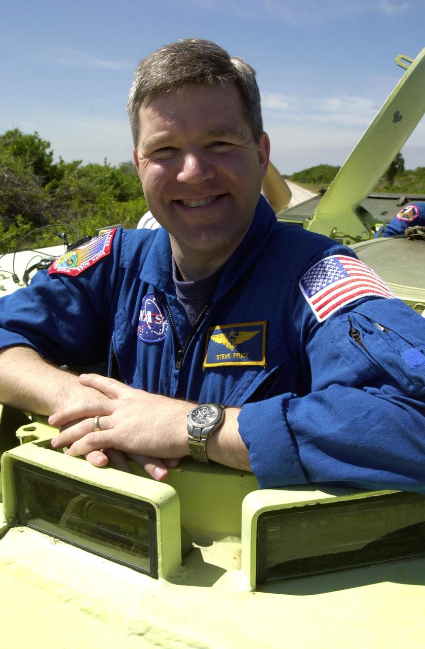 KENNEDY SPACE CENTER, FLA. --  STS-110 Pilot Stephen Frick waits inside the M-113 armored personnel carrier to begin training on driving the vehicle, which is part of Terminal Countdown Demonstration Test activities.  TCDT includes emergency egress training and a simulated launch countdown. The TCDT is held at KSC prior to each Space Shuttle flight. Scheduled for launch April 4, the 11-day mission will feature Shuttle Atlantis docking with the International Space Station (ISS) and delivering the S0 truss, the centerpiece-segment of the primary truss structure that will eventually extend over 300 feet