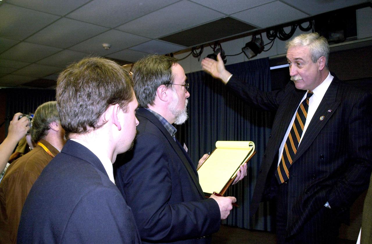 KENNEDY SPACE CENTER, FLA. --   At an STS-109 post-landing conference, NASA Administrator Sean O'Keefe responds to media questions. STS-109 rejuvenated the Hubble Space Telescope in a series of five spacewalks, installing new and improved equipment.  