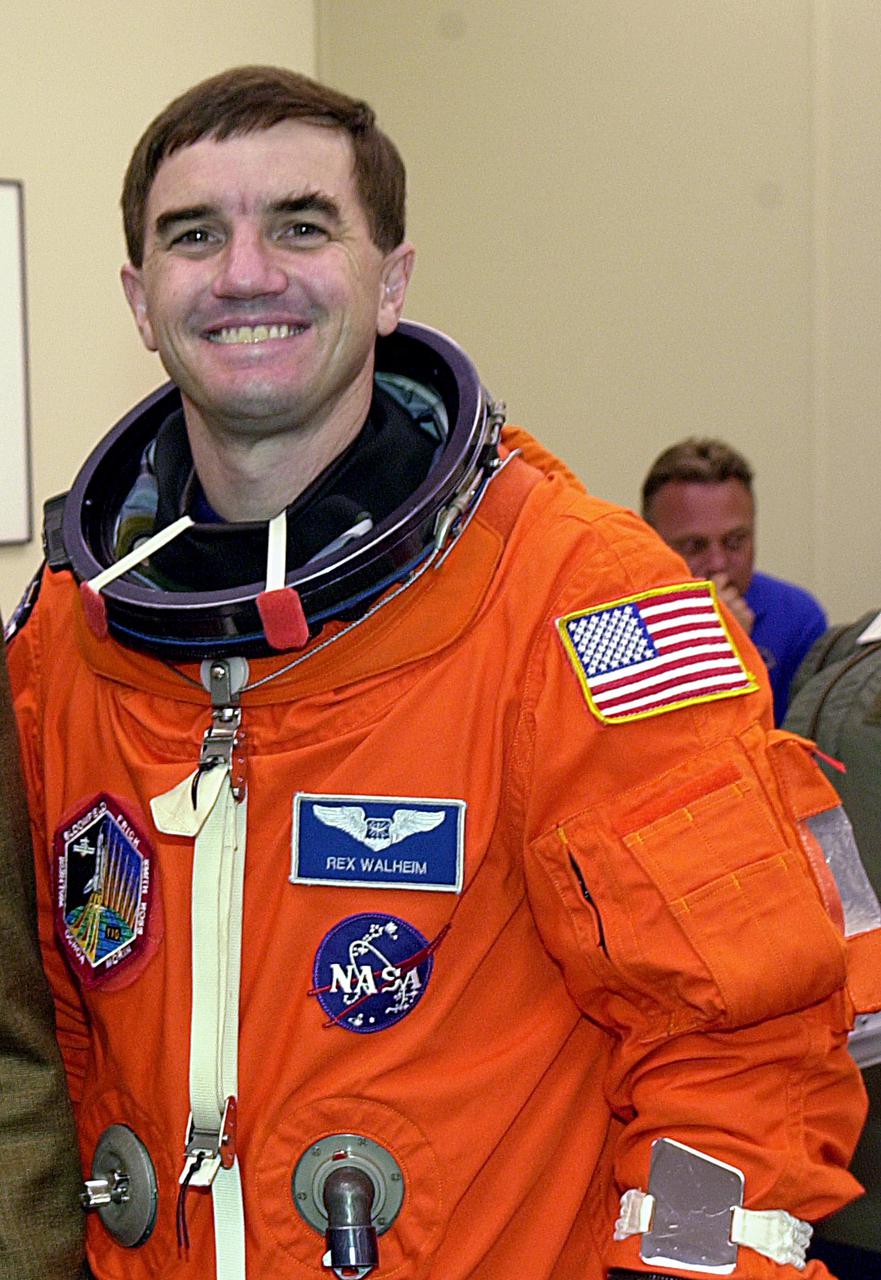 KENNEDY SPACE CENTER, FLA. --  During suitup for launch, STS-110 Mission Specialist Rex J. Walheim smiles in anticipation of his first Shuttle flight.  STS-110 is the 13th assembly flight to the International Space Station, carrying the S0 Integrated Truss Structure and Mobile Transporter (MT).  On the 11-day mission, the mission features four spacewalks to attach the S0 truss, which will become the backbone of the Space Station, to the U.S. Lab, 'Destiny.'   The  MT, a space 'railcar,' is attached to the truss segment and will make its debut run during the flight.  Launch is scheduled for 4:40 p.m. EDT (20:40 GMT)