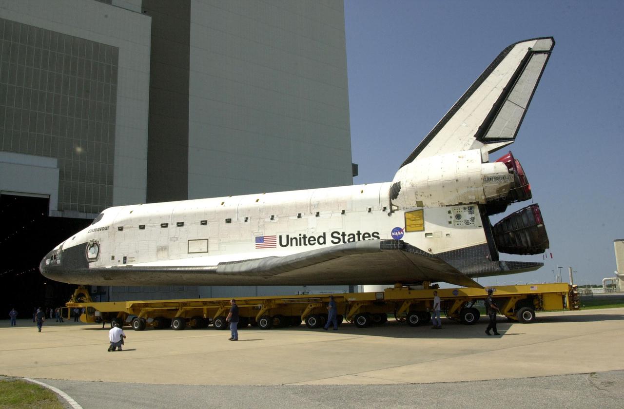 KENNEDY SPACE CENTER, FLA. -- Orbiter Endeavour rolls toward the open bay door of the Vehicle Assembly Building where it will be mated to the External Tank_Solid Rocket Boosters atop the Mobile Launcher Platform. Endeavour is targeted to launch May 30, 2002, on mission STS-111 to the International Space Station. Mission goals include delivering and installing the Mobile Base System to complete the Canadian Mobile Service System and carrying the Expedition 5 crew to the Station for rotation with Expedition 4