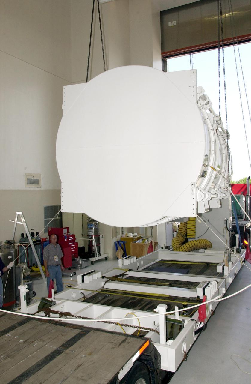 KENNEDY SPACE CENTER, FLA. -- The NASA Comet Nucleus Tour (CONTOUR) spacecraft arrived at KSC on April 24 and was transported to the Spacecraft Assembly and Encapsulation Facility-2 (SAEF-2) to begin final preparations for launch. CONTOUR will provide the first detailed look into the heart of a comet - the nucleus. The spacecraft will fly as close as 60 miles (100 kilometers) to at least two comets, Encke and Schwassmann-Wachmann 3, taking the sharpest pictures yet of the nucleus while analyzing the gas and dust that surround these rocky, icy building blocks of the solar system. The Applied Physics Laboratory of Johns Hopkins University, Baltimore, Md., built CONTOUR and will also be in control of the spacecraft after launch, scheduled for July 1, 2002, from LC 17A at Cape Canaveral Air Force Station
