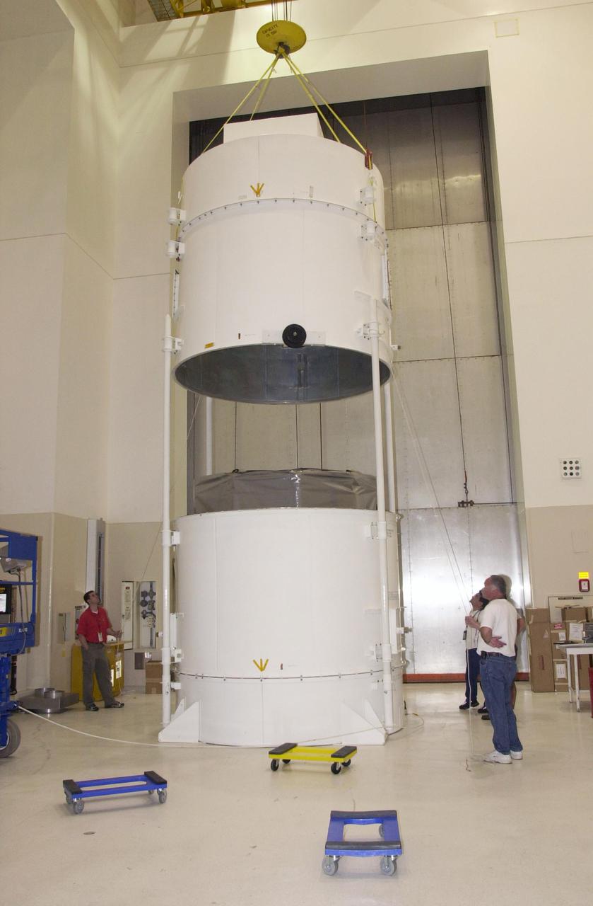 KENNEDY SPACE CENTER, FLA. -- The NASA Comet Nucleus Tour (CONTOUR) spacecraft arrived at KSC on April 24 and was transported to the Spacecraft Assembly and Encapsulation Facility-2 (SAEF-2) to begin final preparations for launch. CONTOUR will provide the first detailed look into the heart of a comet - the nucleus. The spacecraft will fly as close as 60 miles (100 kilometers) to at least two comets, Encke and Schwassmann-Wachmann 3, taking the sharpest pictures yet of the nucleus while analyzing the gas and dust that surround these rocky, icy building blocks of the solar system. The Applied Physics Laboratory of Johns Hopkins University, Baltimore, Md., built CONTOUR and will also be in control of the spacecraft after launch, scheduled for July 1, 2002, from LC 17A at Cape Canaveral Air Force Station