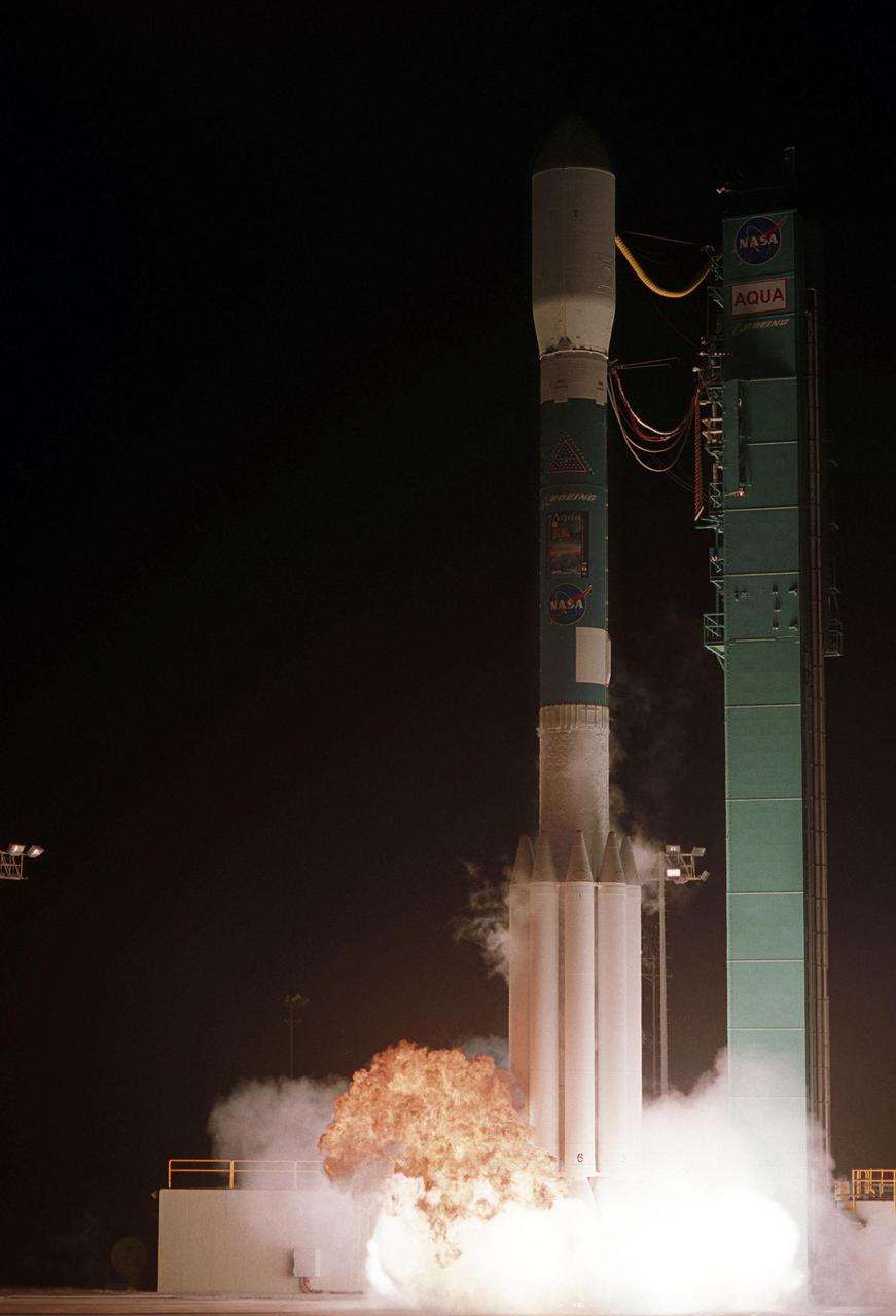 VANDENBERG AIR FORCE BASE, CALIF. -- NASA's latest Earth observing satellite, Aqua, lifts off from the Western Test Range of Vandenberg Air Force Base, Calif., aboard a Delta II rocket at 2:55 a.m. PDT. Aqua is dedicated to advancing our understanding of Earth's water cycle and our environment. Launching the Aqua spacecraft marks a major milestone in support of NASA's mission to help us better understand and protect our planet. Spacecraft separation occurred at 3:54 a.m. PDT, inserting Aqua into a 438-mile (705-kilometer) orbit. [Photo by Bill Ingalls