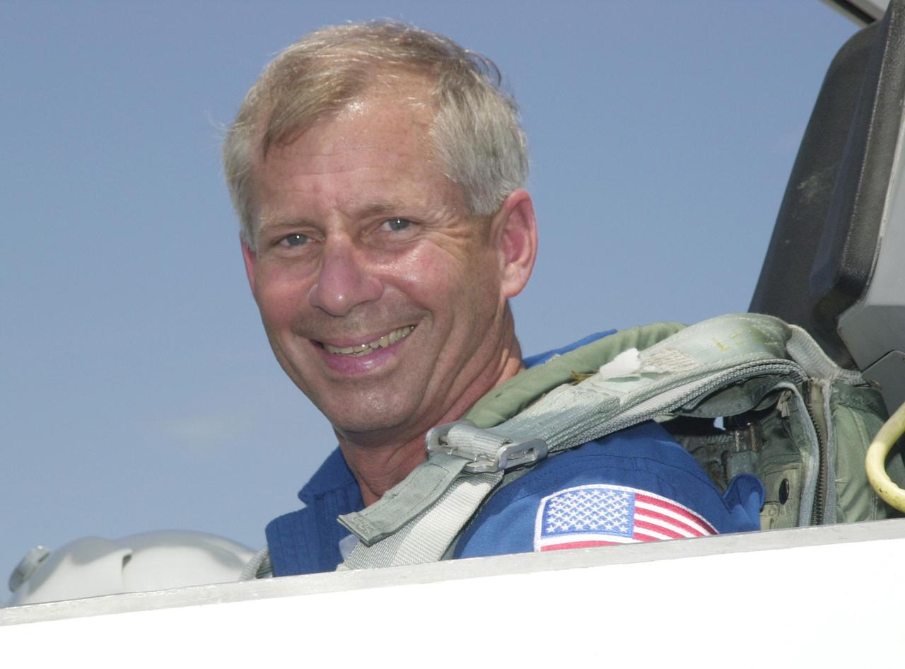KENNEDY SPACE CENTER, FLA. -- STS-111 Commander Kenneth Cockrell sits in the T-38 jet aircraft for his return to Houston. The STS-111 and Expedition 5 crews have completed Terminal Countdown Demonstration Test activities that include emergency egress training and a simulated launch countdown. Expedition 5 will travel to the International Space Station on mission STS-111 as the replacement crew for Expedition 4, who will return to Earth aboard the orbiter. Mission STS-111 is known as Utilization Flight 2, carrying supplies and equipment in the Multi-Purpose Logistics Module Leonardo to the International Space Station.  The payload also includes the Mobile Base System, which will be installed on the Mobile Transporter to complete the Canadian Mobile Servicing System, or MSS, and a replacement wrist_roll joint for Canadarm 2. The mechanical arm will then have the capability to 'inchworm' from the U.S. Lab Destiny to the MSS and travel along the truss to work sites. Launch is scheduled for May 30, 2002