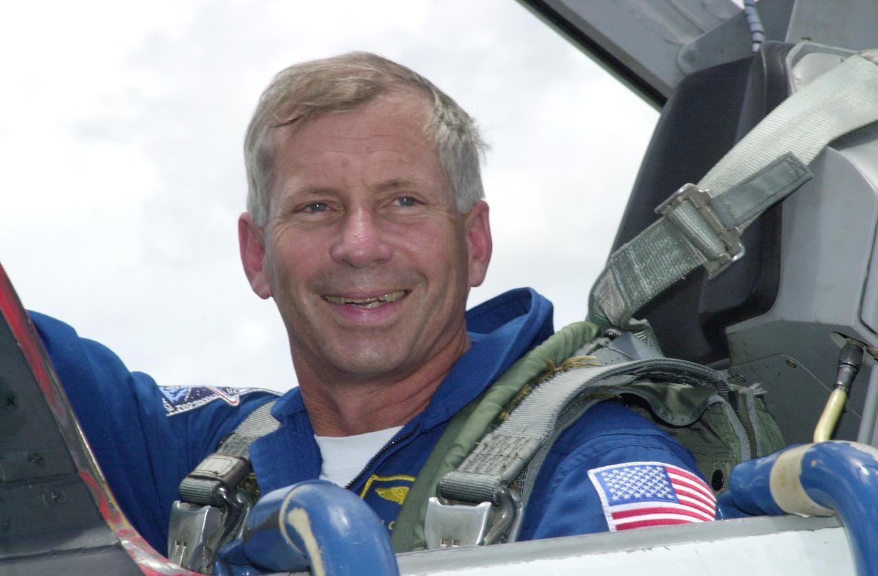 KENNEDY SPACE CENTER, FLA. - STS-111 Commander Kenneth Cockrell is happy to be returning to KSC to prepare for launch. Mission STS-111, known as Utilization Flight 2, is carrying supplies and equipment to the International Space Station. The payload includes the Multi-Purpose Logistics Module Leonardo, the Mobile Base System, which will be installed on the Mobile Transporter to complete the Canadian Mobile Servicing System, or MSS, and a replacement wrist_roll joint for Canadarm 2. The mechanical arm will then have the capability to 'inchworm' from the U.S. Lab Destiny to the MSS and travel along the truss to work sites. Also on board will be Expedition 5, traveling to the Station on Space Shuttle Endeavour as the replacement crew for Expedition 4, who will return to Earth aboard the orbiter. Launch is scheduled for May 30, 2002