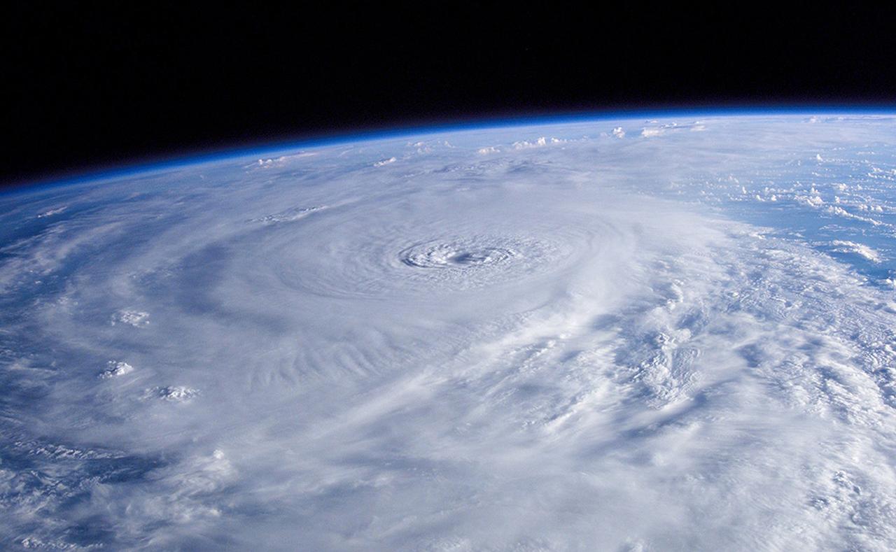 This photo of hurricane Lili, captured during the Expedition Five mission, shows the compact storm system and the structure of its estimated 15 nautical mile wide eye. After strengthening to a Category 4 storm (125 knots with the central pressure of 940 millibars), Lili weakened to a Category 2 before slamming into the central coast of Louisiana just south of Lafayette. This is one of many photos that stem form the Crew Observation (CEO) experiment that has been a part of every Space Station expedition.