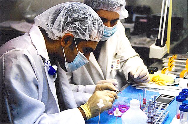 Experiments to seek solutions for a range of biomedical issues are at the heart of several investigations that will be hosted by the Commercial Instrumentation Technology Associates (ITA), Inc. Biomedical Experiments (CIBX-2) payload. CIBX-2 is unique, encompassing more than 20 separate experiments including cancer research, commercial experiments, and student hands-on experiments from 10 schools as part of ITA's ongoing University Among the Stars program. Student Marnix Aklian and ITA's Mark Bem prepare biological samples for flight as part of ITA's hands-on student outreach program on STS-95. Similar activities are a part of the CIBX-2 payload. The experiments are sponsored by NASA's Space Product Development Program (SPD).