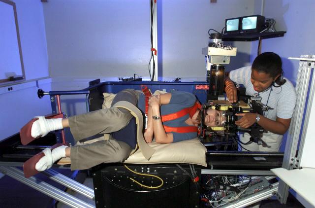 The short-arm centrifuge subjects an astronaut to conflicting sensory input and study the astronaut's perception of motion. It is one of several instruments used in the Spatial Reorientation Following Space Flight investigation to be conducted on crewmembers. During space flight, the vestibular organs no longer respond in a familiar way. Instead, inputs from the irner ear do not match those coming from the eyes. While on Earth, you can open your eyes to see if you truly are spinning, but astronauts do not have this luxury. Astronauts can see the floor, but have no sense of down; when they bend their heads forward, the otoliths are not stimulated properly. This state, called sensory conflict, must be resolved by the brain to maintain orientation. When they first return to Earth, astronauts are again disoriented because of sensory conflict. They undergo a period of spatial reorientation, as their brains reconcile what their eyes see and what their vestibular system senses. Recovery can take anywhere from hours to days depending on the length of the mission. Principal Investigator: Dr. William Paloski, Johnson Space Center, Houston, TX.