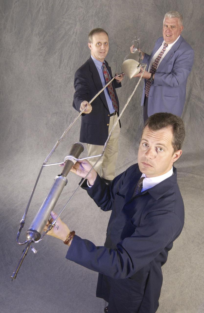 In honor of the Centernial of Flight celebration and commissioned by the American Institute of Aeronautics and Astronautics (AIAA), a team of engineers from Marshall Space Flight Center (MSFC) built a replica of the first liquid-fueled rocket. The original rocket, designed and built by rocket engineering pioneer Robert H. Goddard in 1926, opened the door to modern rocketry. Goddard's rocket reached an altitude of 41 feet while its flight lasted only 2.5 seconds. The Marshall design team's plan was to stay as close as possible to an authentic reconstruction of Goddard's rocket. The same propellants were used - liquid oxygen and gasoline - as available during Goddard's initial testing and firing. The team also tried to construct the replica using the original materials and design to the greatest extent possible. By purposely using less advanced techniques and materials than many that are available today, the team encountered numerous technical challenges in testing the functional hardware. There were no original blueprints or drawings, only photographs and notes. However, this faithful adherence to historical accuracy has also allowed the team to experience many of the same challenges Goddard faced 77 years ago, and more fully appreciate the genius of this extraordinary man. The replica will undergo ground tests at MSFC this summer.