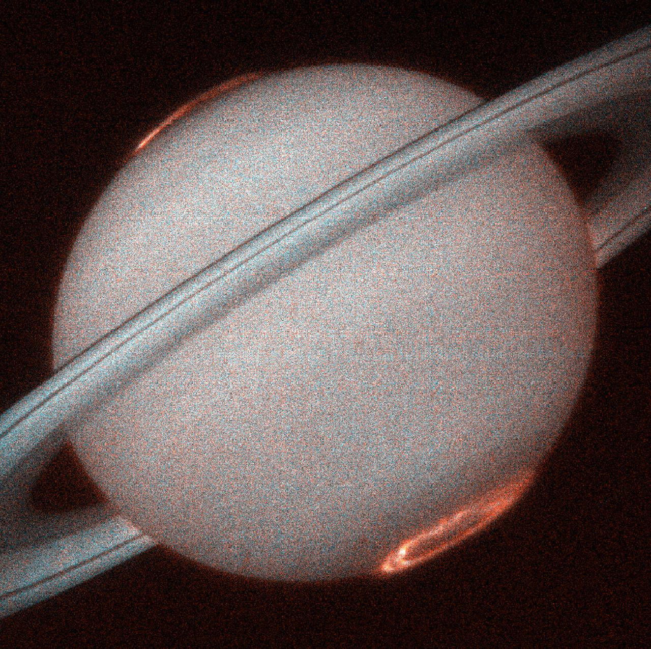 This is the first image of Saturn's ultraviolet aurora taken by the Space Telescope Imaging Spectrograph (STIS) on board the Hubble Space Telescope (HST) in October 1998, when Saturn was a distance of 810 million miles (1.3 billion kilometers) from Earth. The new instrument, used as a camera, provides more than 10 times the sensitivity of the previous HST instruments in the ultraviolet. STIS images reveal exquisite detail never before seen in the spectacular auroral curtains of light that encircle Saturn's north and south poles which rise more than a thousand miles above the cloud tops. Saturn's auroral displays are caused by an energetic wind from the Sun that sweeps over the planet, much like the Earth's aurora that is occasionally seen in the nighttime sky. Unlike the Earth, Saturn's aurora is only seen in ultraviolet light that is invisible from the Earth's surface, hence can only be observed from space.