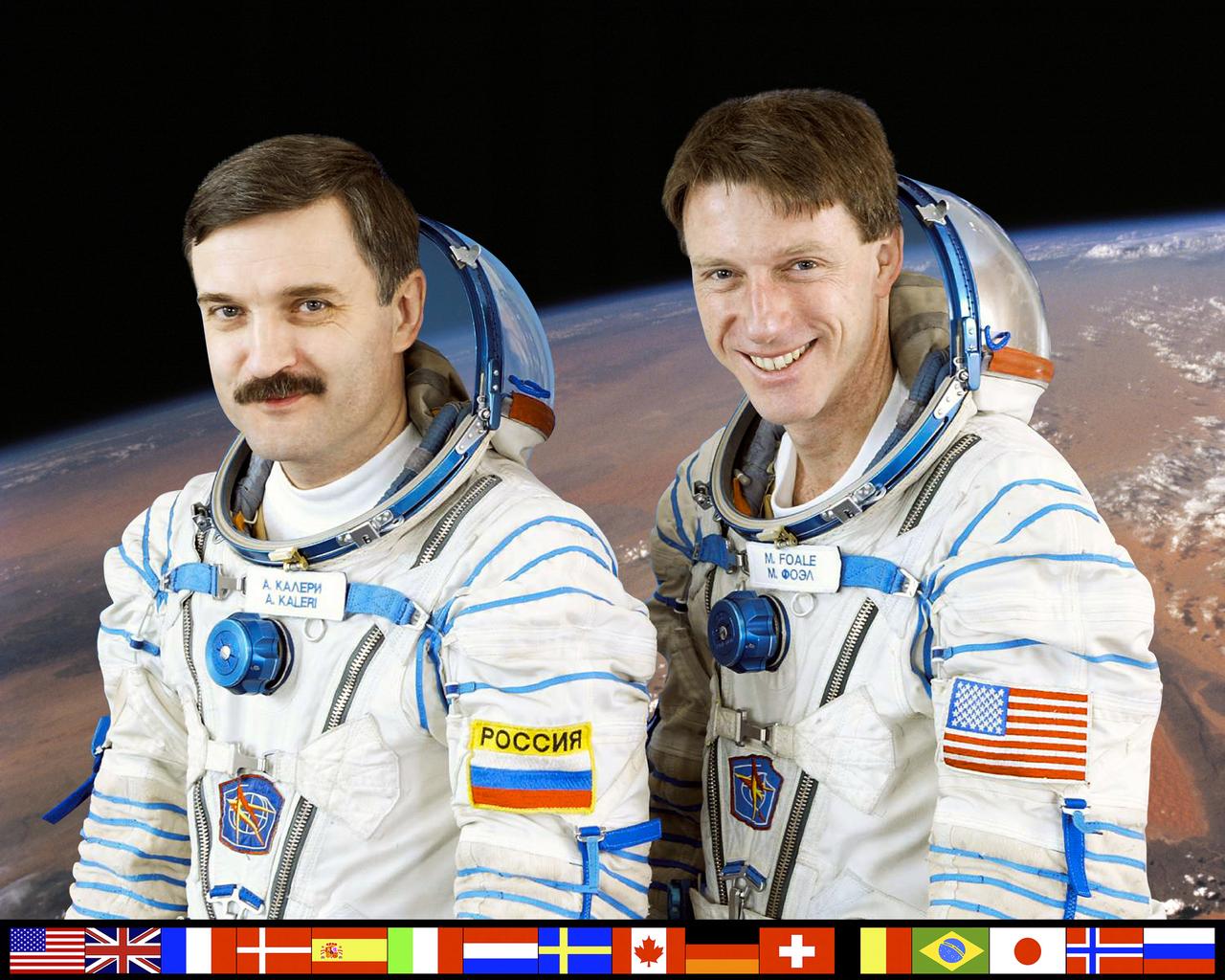 This is a portrait of the Expedition-8 two man crew. Pictured left is Cosmonaut Alexander Y, Kaleri, Soyuz Commander and flight engineer; and Michael C. Foale (right), Expedition-8 Mission Commander and NASA ISS Science Officer. The crew posed for this portrait while training at the Gagarin Cosmonaut Training Center in Star City, Russia. The two were launched for the International Space Station (ISS) aboard a Soyuz TMA-3 spacecraft from the Baikonur Cosmodrome, Kazakhstan, along with European Space Agency (ESA) Astronaut Pedro Duque of Spain, on October 18, 2003.