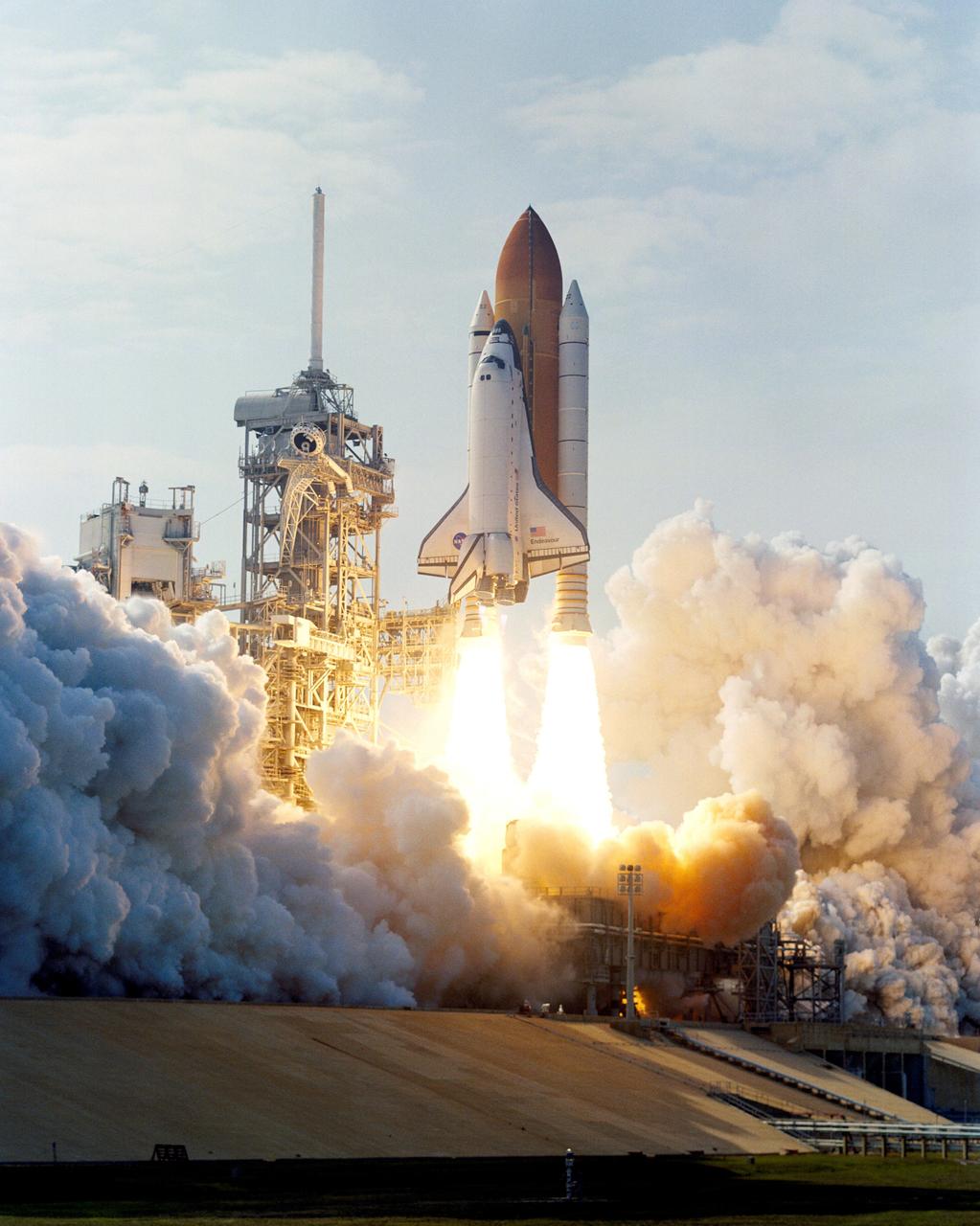 Aboard the Space Shuttle Orbiter Endeavour, the STS-111 mission was launched on June 5, 2002 at 5:22 pm EDT from Kennedy's launch pad. On board were the STS-111 and Expedition Five crew members. Astronauts Kenneth D. Cockrell, commander; Paul S. Lockhart, pilot, and mission specialists Franklin R. Chang-Diaz and Philippe Perrin were the STS-111 crew members. Expedition Five crew members included Cosmonaut Valeri G. Korzun, commander, Astronaut Peggy A. Whitson and Cosmonaut Sergei Y. Treschev, flight engineers. Three space walks enabled the STS-111 crew to accomplish mission objectives: the delivery and installation of a new platform for the ISS robotic arm, the Mobile Base System (MBS) which is an important part of the Station's Mobile Servicing System allowing the robotic arm to travel the length of the Station; the replacement of a wrist roll joint on the Station's robotic arm; and unloading supplies and science experiments from the Leonardo Multi-Purpose Logistics Module, which made its third trip to the orbital outpost. Landing on June 19, 2002, the 14-day STS-111 mission was the 14th Shuttle mission to visit the ISS.