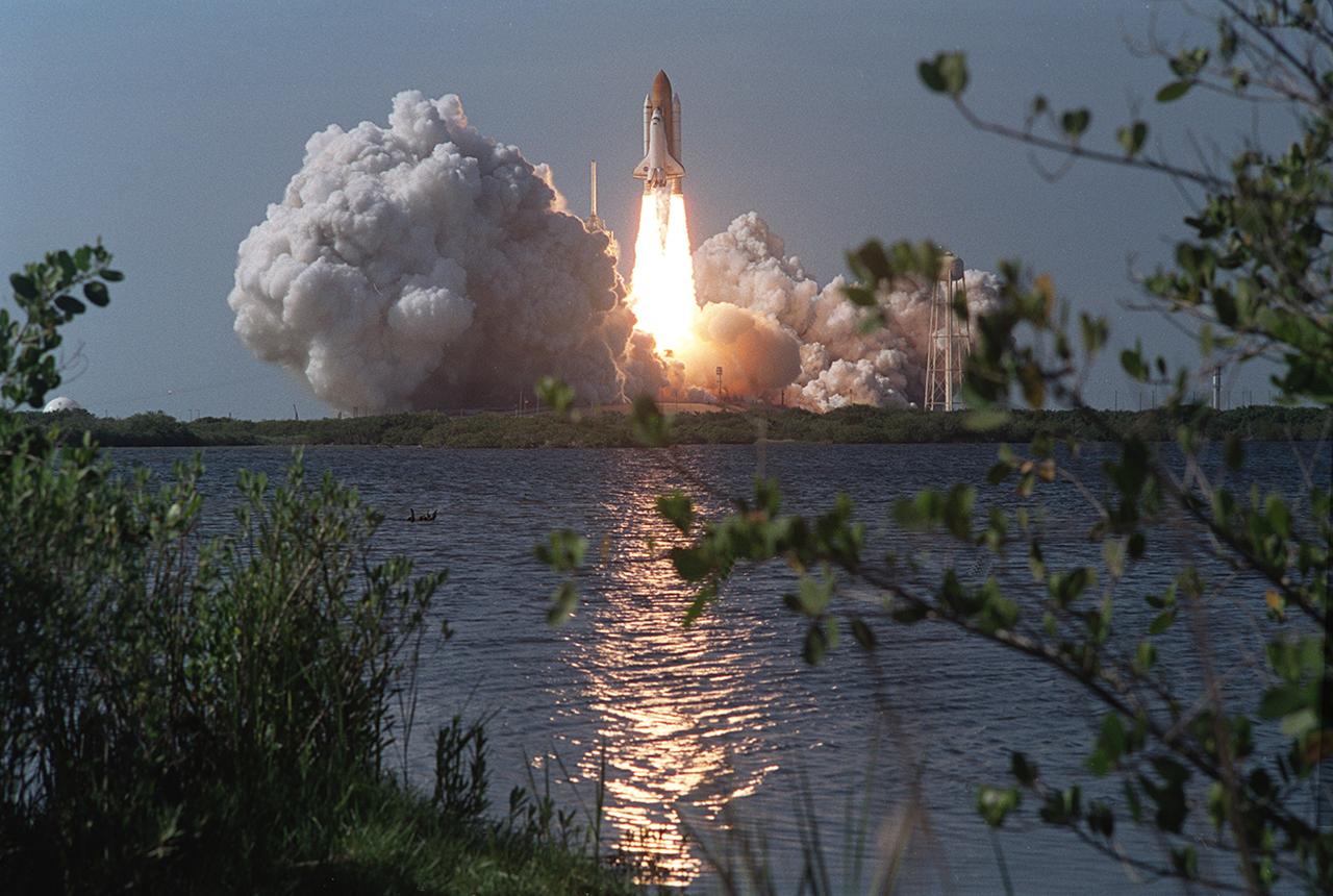 The Space Shuttle Orbiter Atlantis STS-110, embarking on its 25th flight, lifts off from launch pad 39B at Kennedy Space Center at 3:44 p.m. CDT April 8, 2002. The STS-110 mission prepared the International Space Station (ISS) for future space walks by installing and outfitting a 43-foot-long Starboard side S0 truss and preparing the Mobile Transporter. The 27,000 pound S0 Truss was the first of 9 segments that will make up the Station's external framework that will eventually stretch 356 feet (109 meters), or approximately the length of a football field. This central truss segment also includes a flatcar called the Mobile Transporter and rails that will become the first "space railroad," which will allow the Station's robotic arm to travel up and down the finished truss for future assembly and maintenance. The completed truss structure will hold solar arrays and radiators to provide power and cooling for additional international research laboratories from Japan and Europe that will be attached to the Station. Milestones of the S-110 mission included the first time the ISS robotic arm was used to maneuver space walkers around the Station and marked the first time all space walks were based out of the Station's Quest Airlock. It was also the first Shuttle to use three Block II Main Engines.