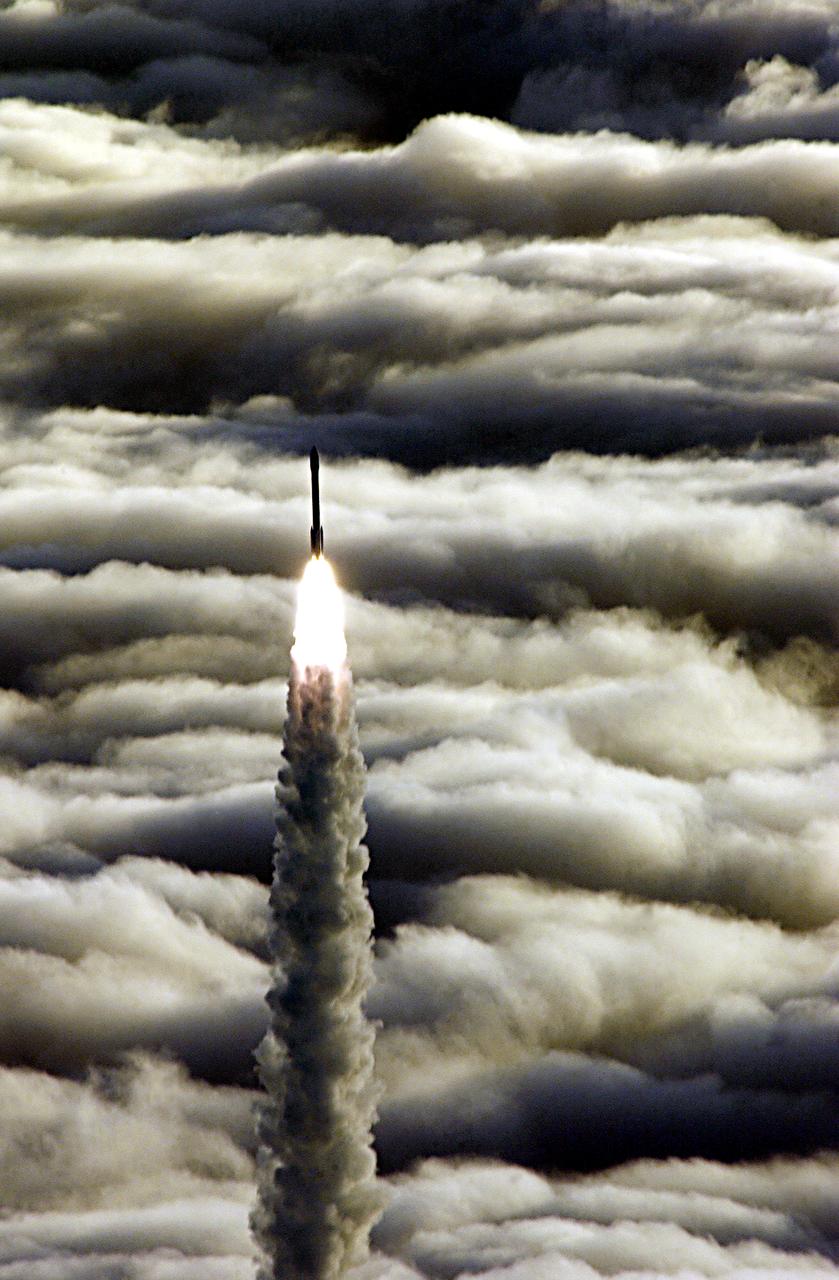 Vandenberg AFB CA--  A Boeing Delta II rocket soars above the clouds here today at Vandenberg AFB CA.  The NASA payload aboard the rocket is the ICESat, an Ice Cloud and land Elevation Satellite, and CHIPSat, a Cosmic Hot Interstellar Plasma Spectrometer.  ICESat, a 661-pound satellite, is a benchmark satellite for the Earth Observing System that will help scientists determine if the global sea level is rising or falling.  It will observe the ice sheets that blanket the Earth’s poles to determine if they are growing or shrinking.  It will assist in developing an understanding of how changes in the Earth’s atmosphere and climate affect polar ice masses and global sea level.  The Geoscience Laser Altimeter System is the sole instrument on the satellite.  CHIPSat, a suitcase-size 131-pound satellite, will provide information about the origin, physical processes and properties of the hot gas contained in the interstellar medium.  This launch, marks the first Delta from Vandenberg this year.   (USAF photo by: SSgt Lee A Osberry Jr.)