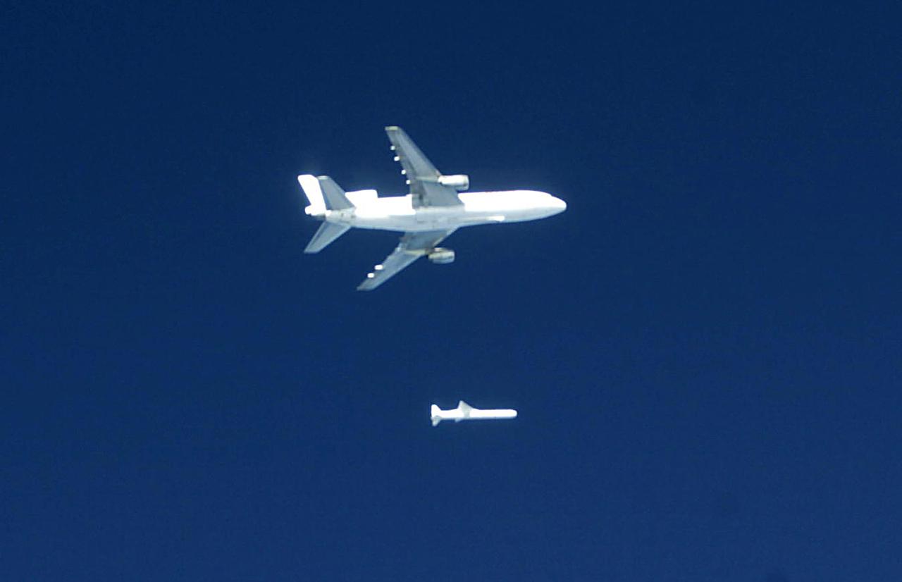 Orbital Sciences Corportation's L1011 releases a Pegasus rocket before ignition, January 25, 2003, off the coast of Cape Canaveral, FL,  which will deliver the SORCE satellite, Solar Radiation and Climate Experiment, into the low-Earth orbit. The joint project with Orbital, NASA and the University of Colorado satellite is an atmospheric instrument that will measure incoming radiant energy from the sun. Scientists will use this to address long term atmospheric and climate changes. Other uses will be for ozone research and ultraviolet radiation. (Photo by Eric Roback and Rob Rivers, NASA Langley Research Center)