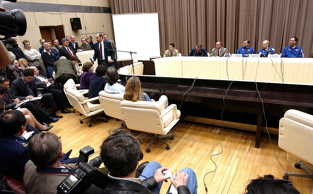 May 6, 2003.  Star City, Russia. Expedition Six Flight Engineer Nikolai Budarin (L), Commander Ken Bowersox (C),  and NASA ISS Science Officer Don Pettit (R) answer questions during a Press Conference at the Gagarin Cosmonaut Training Center in Star City, Russia.  Photo Credit: "NASA/Bill Ingalls"
