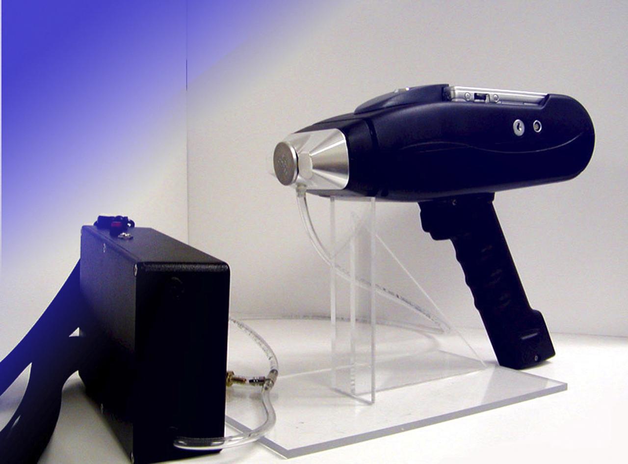 Marshall Space Flight Center engineers have teamed with KeyMaster Technologies, Kennewick, Washington, to develop a portable vacuum analyzer that performs on-the-spot chemical analyses under field conditions, a task previously only possible in a chemical laboratory. The new capability is important not only to the aerospace industry, but holds potential for broad applications in any industry that depends on materials analysis, such as the automotive and pharmaceutical industries. Weighing in at a mere 4 pounds, the newly developed handheld vacuum X-ray fluorescent analyzer can identify and characterize a wide range of elements, and is capable of detecting chemical elements with low atomic numbers, such as sodium, aluminum and silicon. It is the only handheld product on the market with that capability. Aluminum alloy verification is of particular interest to NASA because vast amounts of high-strength aluminum alloys are used in the Space Shuttle propulsion system such as the External Tank, Main Engine, and Solid Rocket Boosters. This capability promises to be a boom to the aerospace community because of unique requirements, for instance, the need to analyze Space Shuttle propulsion systems on the launch pad. Those systems provide the awe-inspiring rocket power that propels the Space Shuttle from Earth into orbit in mere minutes. The scanner development also marks a major improvement in the quality assurance field, because screws, nuts, bolts, fasteners, and other items can now be evaluated upon receipt and rejected if found to be substandard. The same holds true for aluminum weld rods.  The ability to validate the integrity of raw materials and partially finished products before adding value to them in the manufacturing process will be of benefit not only to businesses, but also to the consumer, who will have access to a higher value product at a cheaper price. Three vacuum X-ray scanners are already being used in the Space Shuttle Program. The External Tank Project Office is using one for aluminum alloy analysis, while a Marshall contractor is evaluating alloys with another unit purchased for the Space Shuttle Main Engine Office. The Reusable Solid Rocket Motor Project Office has obtained a scanner that is being used to test hardware and analyze materials. 