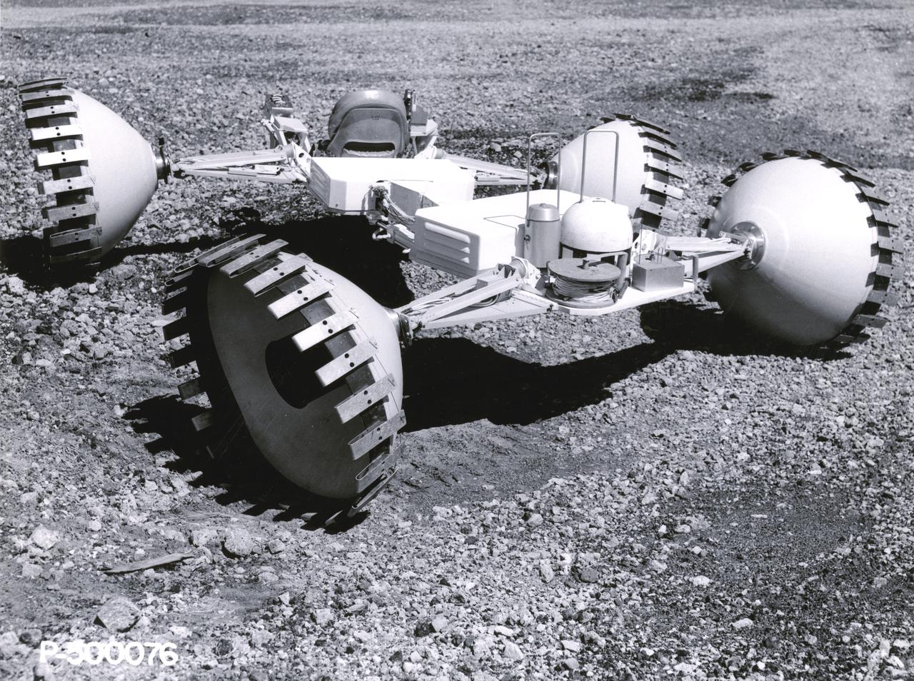 A concept of a possible Lunar Roving Vehicle (LRV) built for NASA’s Marshall Space Flight Center (MSFC). This Mobility Test Article (MTA) is one of many that provided data contributing to the design of the LRV, developed under the direction of MSFC. The LRV was designed to allow Apollo astronauts a greater range of mobility during lunar exploration missions. 
