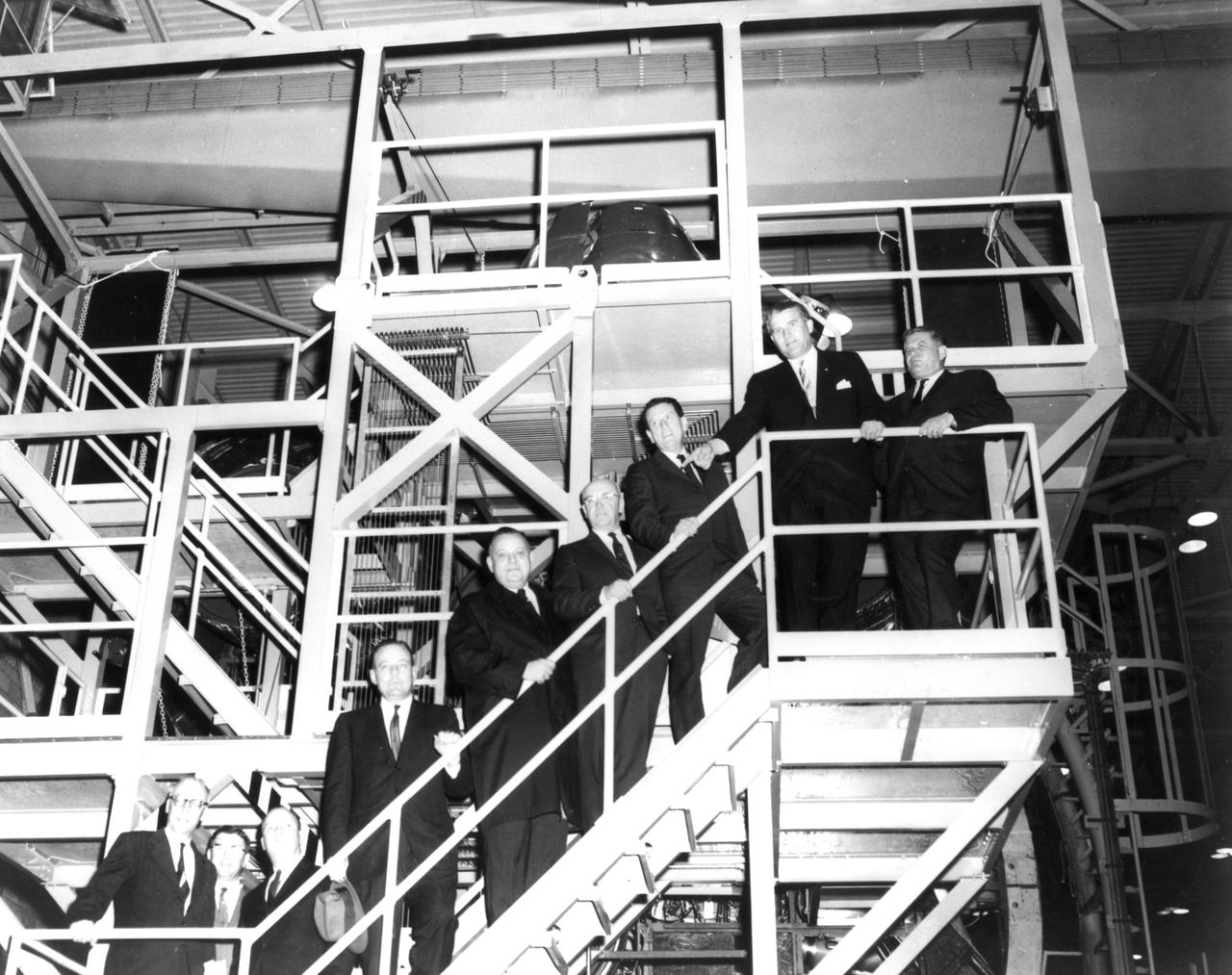 The members of the House Committee on Science and Astronautics visited the Marshall Space Flight Center (MSFC) on March 9, 1962 to gather firsthand information of the nation’s space exploration program. The congressional group was composed of members of the Subcommittee on Manned Space Flight. Pictured from left-to-right are Congressman Ken Hechler, Democratic representative of West Virginia; Dieter Grau, MSFC; Congressman John W. Davis, Democratic representative of Georgia; Congressman Joe Waggoner, Democratic representative of Louisiana; Congressman Richard L. Roudebush, Republican representative of Indiana; Congressman R. Walter Riehlman, Republican representative of New York; Congressman James G. Fulton, Republican representative of Pennsylvania; Dr. Wernher von Braun, MSFC; and Congressman Olin E. Teague, Democratic representative of Texas.  