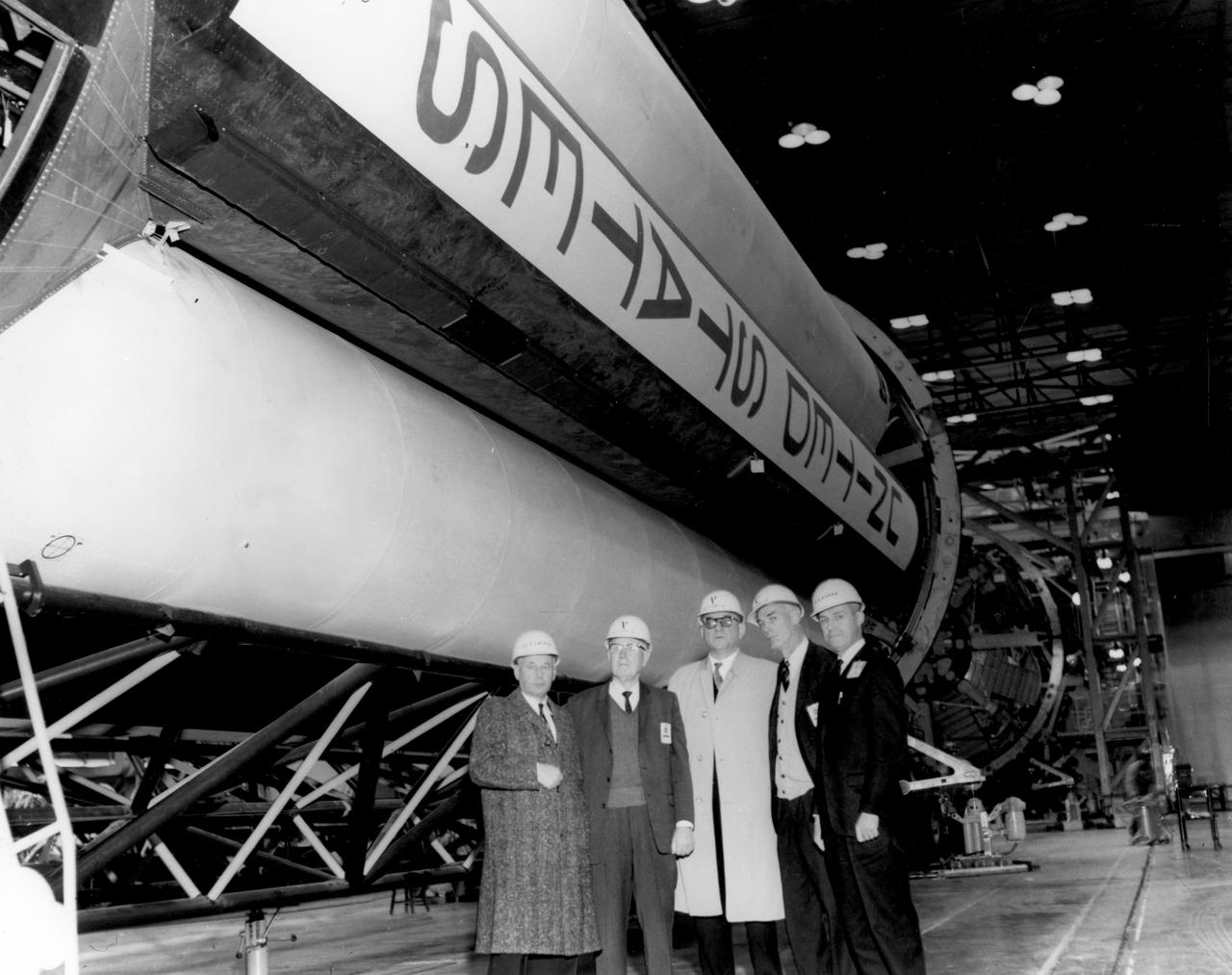 Members of the House Committee on Science and Astronautics visited the Marshall Space Flight Center (MSFC) on January 3, 1962 to gather firsthand information of the nation’s space exploration program. The congressional group was composed of members of the Subcommittee on Manned Space Flight. Shown here at MSFC’s Manufacturing Engineering Laboratory are (left to right): Dr. Eberhard Rees, MSFC; Congressman George P. Miller, Democratic representative of California; Congressman F. Edward Hebert, Democratic representative of Louisiana; Congressman Robert R. Casey, Democratic representative of Texas; and Werner Kuers, MSFC.