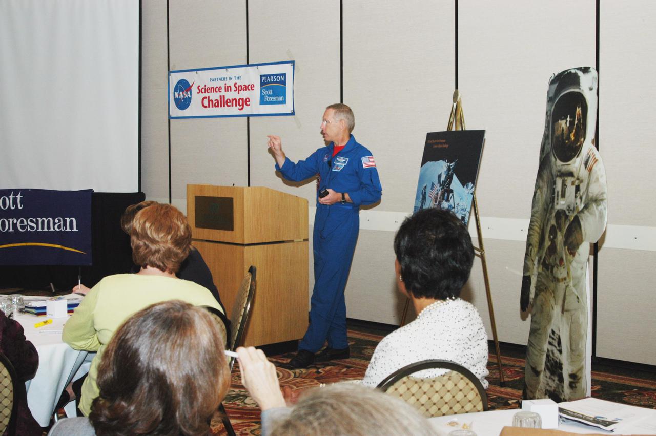 KENNEDY SPACE CENTER, FLA. - NASA astronaut Patrick Forrester addresses a group of educators assembled for the kickoff of 'The Science in Space Challenge' at the Doubletree Hotel in Orlando, Fla. The national challenge program is sponsored by NASA and Pearson Scott Foresman, publisher of pre-K through grade six educational books. To participate in the challenge, teachers may submit proposals, on behalf of their students, for a science and technology investigation. Astronauts will conduct the winning projects on a Space Shuttle mission or on the International Space Station, while teachers and students follow along via television or the Web. For more information about the announcement, see the news release at http:__www.nasa.gov_home_hqnews_2004_oct_HQ_04341_publication.html.