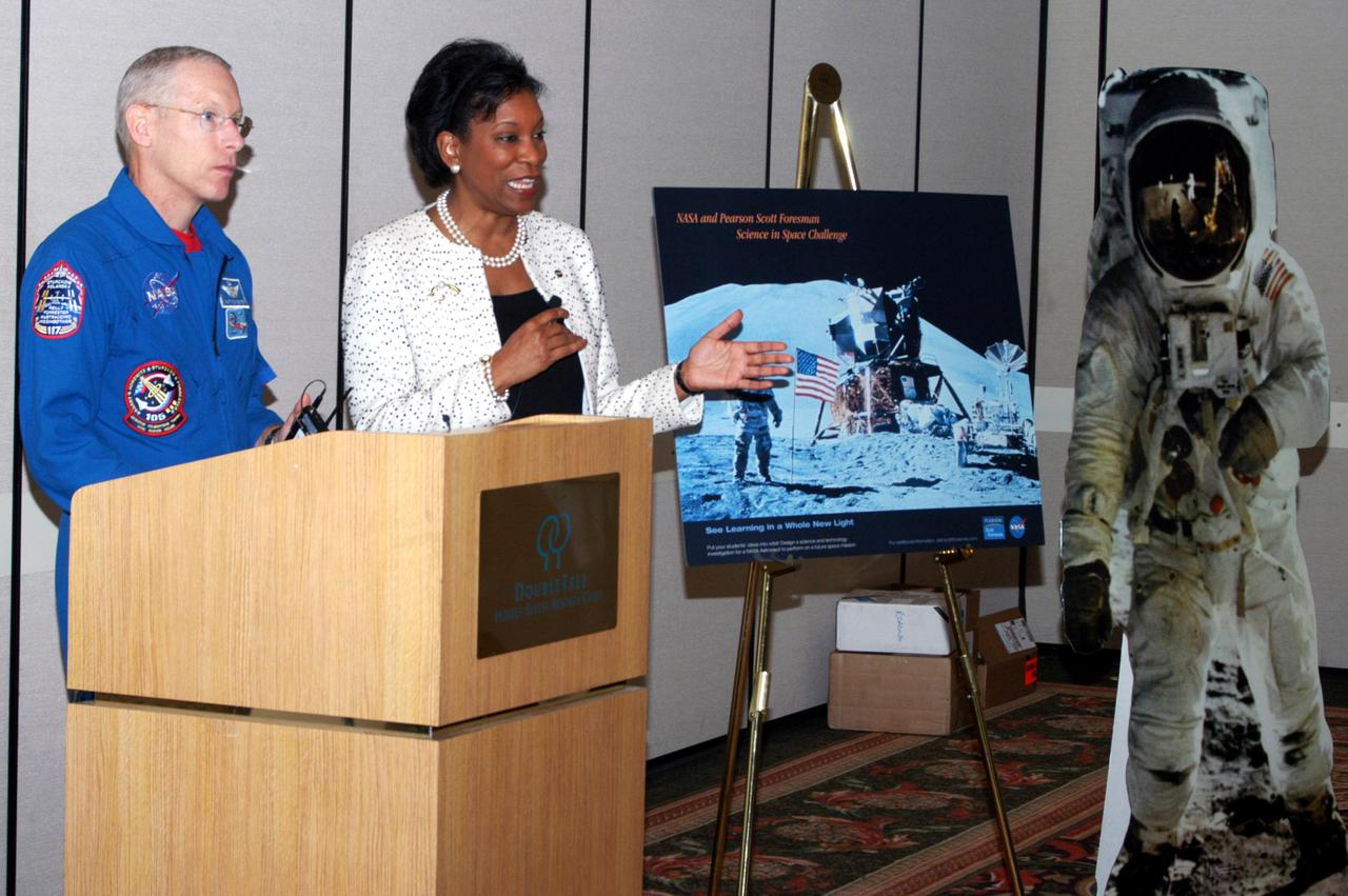 KENNEDY SPACE CENTER, FLA. -   NASA astronaut Patrick Forrester (left) and Dr. Adena Williams Loston, NASA chief education officer, address a group of educators assembled for the kickoff of 'The Science in Space Challenge' at the Doubletree Hotel in Orlando, Fla. The national challenge program is sponsored by NASA and Pearson Scott Foresman, publisher of pre-K through grade six educational books. To participate in the challenge, teachers may submit proposals, on behalf of their students, for a science and technology investigation. Astronauts will conduct the winning projects on a Space Shuttle mission or on the International Space Station, while teachers and students follow along via television or the Web. For more information about the announcement, see the news release at http:__www.nasa.gov_home_hqnews_2004_oct_HQ_04341_publication.html.