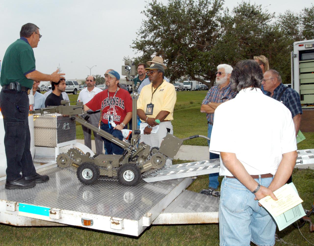 KENNEDY SPACE CENTER, FLA. -  KSC employees learn about a mechanical robot displayed at an exhibit during Spaceport Super Safety and Health Day. The event included guest speakers Dr. Pamela Peeke, Navy Com. Stephen E. Iwanowicz, NASA’s Dr. Kristine Calderon and Olympic-great Bruce Jenner.  In addition, many vendors’ exhibits were on display for employees.  Super Safety and Health Day was initiated at KSC in 1998 to increase awareness of the importance of safety and health among the government and contractor workforce.  The theme for this year’s event was “Safety and Health: A Winning Combination.”