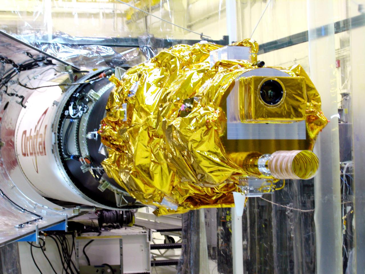 KENNEDY SPACE CENTER, FLA. - At Vandenberg Air Force Base in California, the Demonstration of Autonomous Rendezvous Technology (DART) waits for fairing installation. The fairing will encapsulate DART and protect it while on the launch pad and during ascent. DART was designed and built for NASA by Orbital Sciences as an advanced flight demonstrator to locate and maneuver near an orbiting satellite. The DART spacecraft weighs about 800 pounds and is nearly 6 feet long and 3 feet in diameter. From beneath the belly of the Orbital Sciences L-1011 aircraft, the Pegasus XL vehicle will launch DART into a circular polar orbit of approximately 475 miles. The DART satellite provides a key step in establishing autonomous rendezvous capabilities for the U.S. Space Program. While previous rendezvous and docking efforts have been piloted by astronauts, the unmanned DART satellite will have computers and cameras to perform its rendezvous functions.