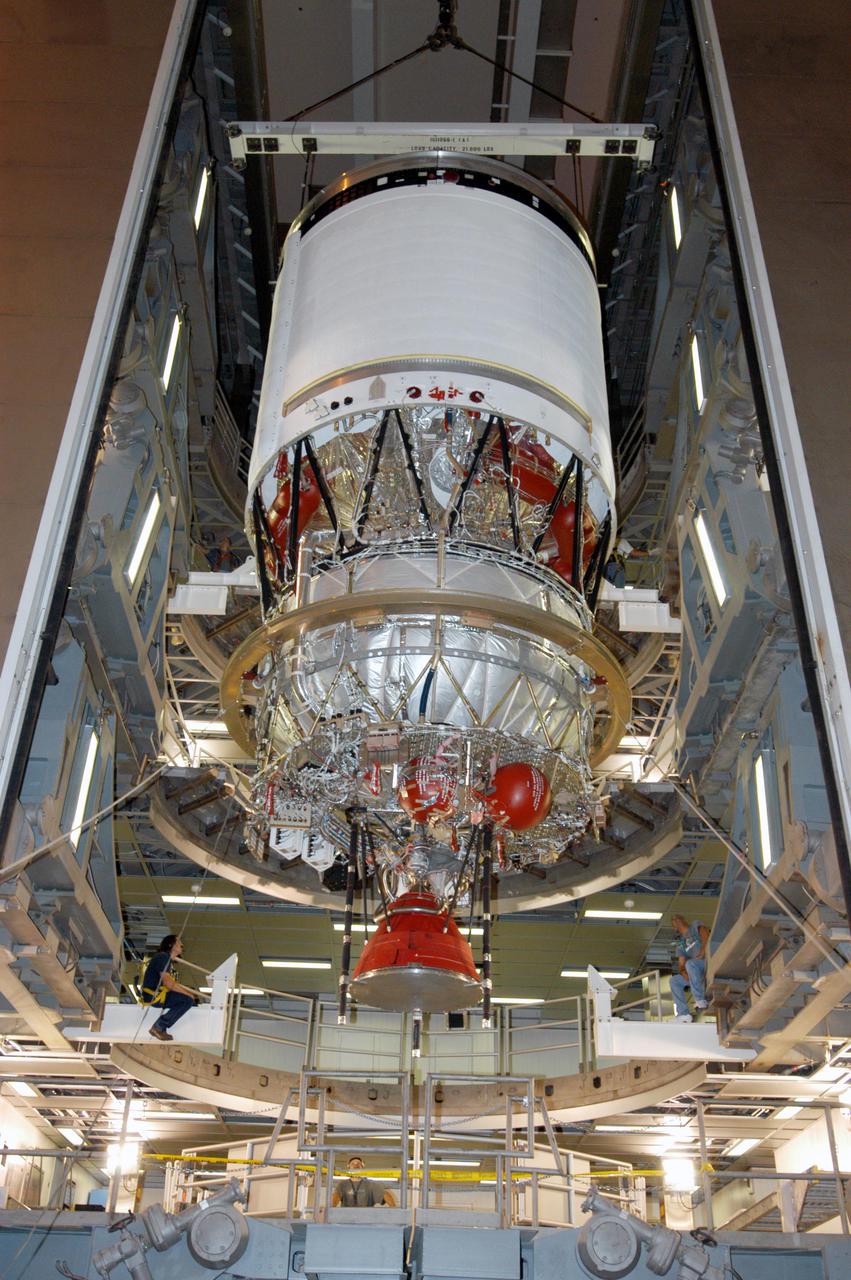 KENNEDY SPACE CENTER, FLA. - At the Boeing Delta Operations Center, the Delta IV second stage is moved to a test stand. Nozzles will be installed and a deployment test will follow. The Delta IV rocket will be used for the 2005 launching of the GOES-N weather satellite for NASA and NOAA (National Oceanic and Atmospheric Administration). The first in a series of three advanced weather satellites including GOES-O and GOES-P, the GOES-N will provide continuous monitoring necessary for intensive data analysis. It will provide a constant vigil for the atmospheric “triggers” of severe weather conditions such as tornadoes, flash floods, hail storms and hurricanes. When these conditions develop, GOES-N will be able to monitor storm development and track their movements.