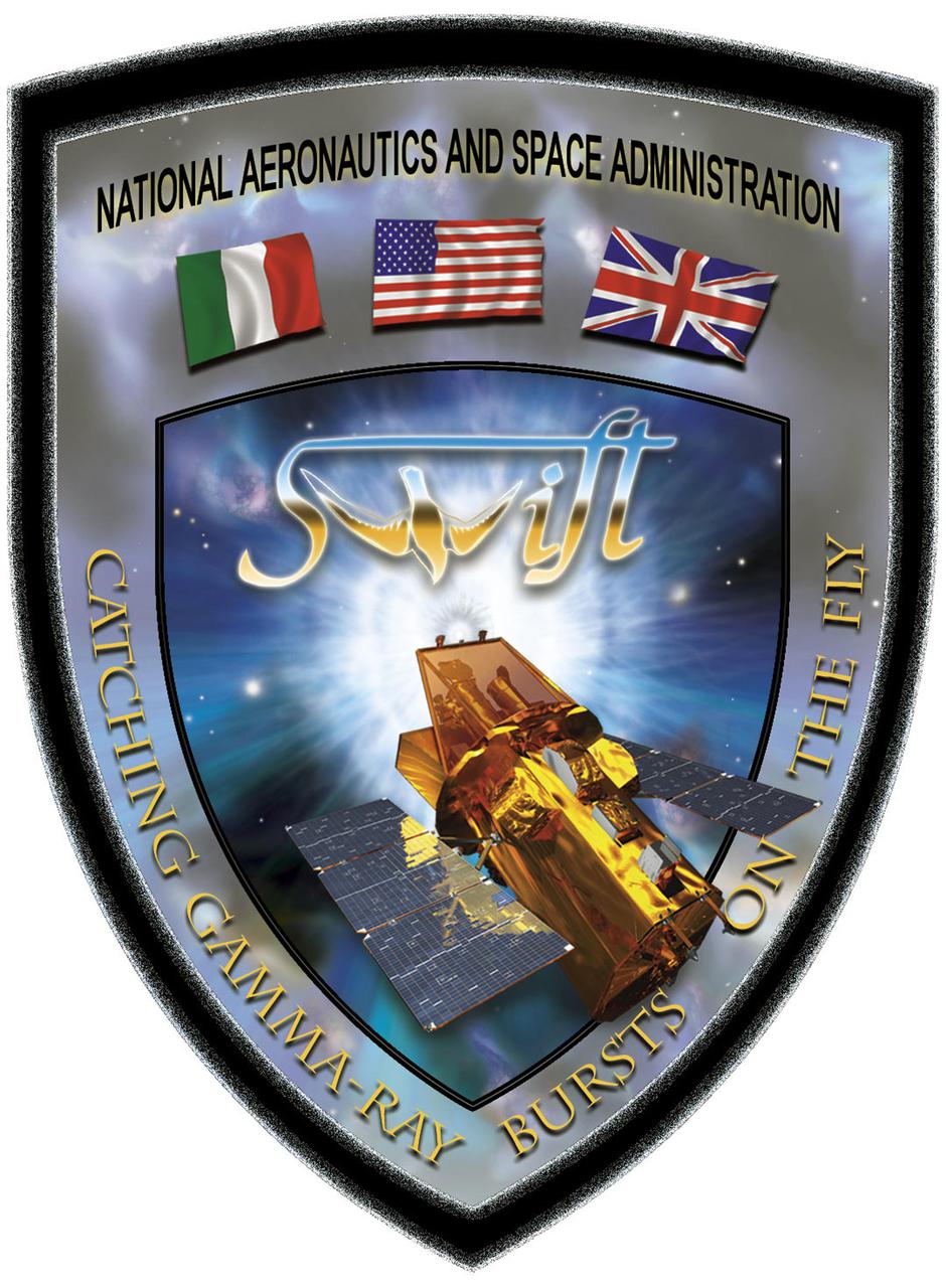 KENNEDY SPACE CENTER, FLA. - The Swift mission patch depicts both the spacecraft and the bird for which it was named. The observatory is named after a small, nimble bird that can grab up insects as it flies through the sky. Similarly, the observatory can swiftly turn and point its instruments to catch a gamma-ray burst 'on the fly' to study both the burst and its afterglow. This afterglow phenomenon follows the initial gamma-ray flash in most bursts and it can linger in X-ray light, visible light and radio waves for hours or weeks, providing great detail for observations.